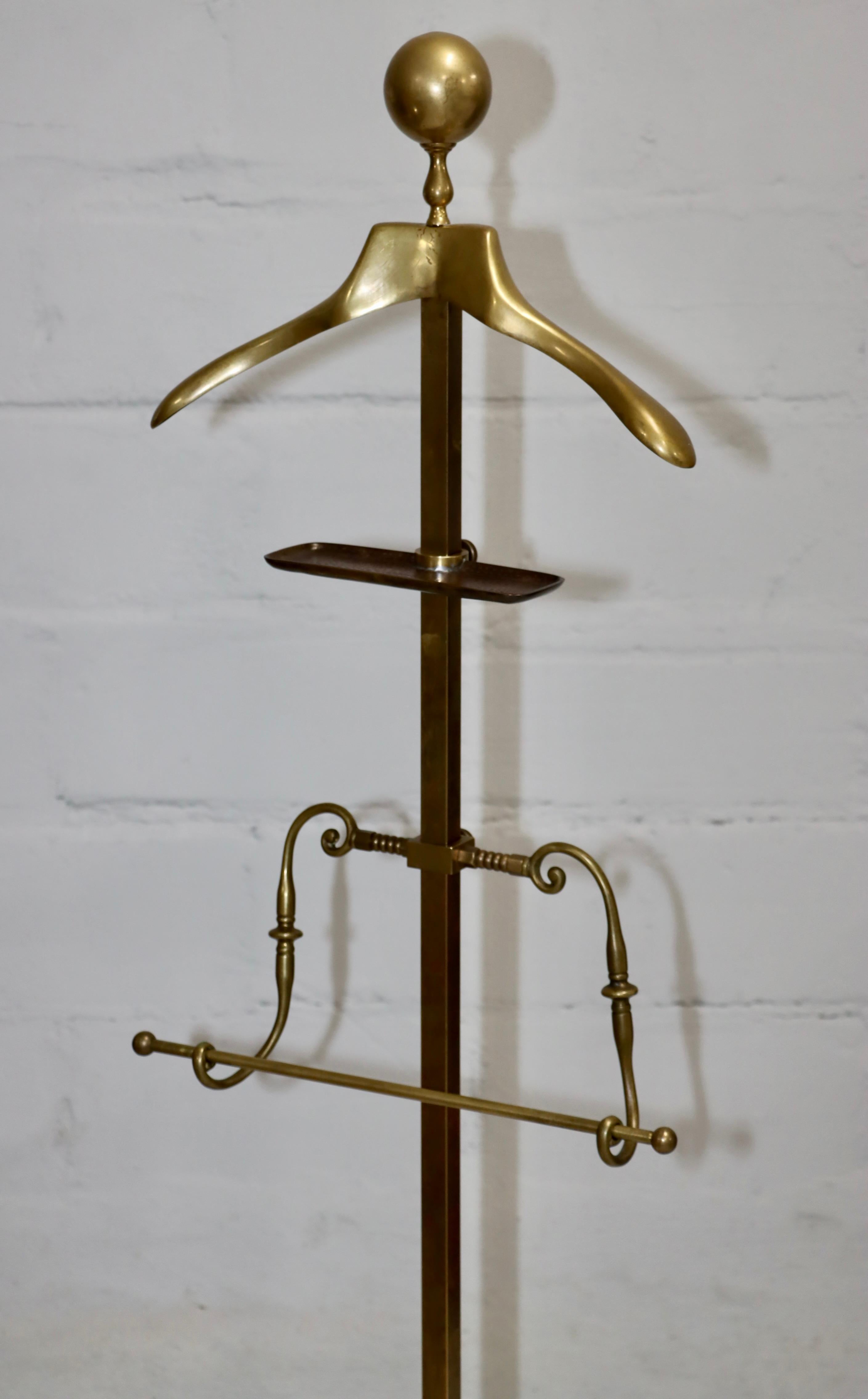 1960's modern patinated brass valet stand, in vintage original condition with some wear and patina due to age and use.