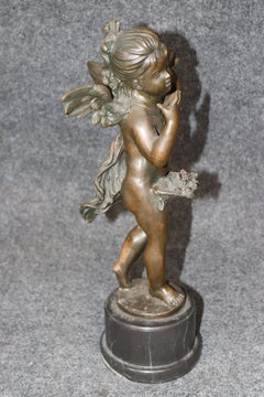 1960's Patinated Winged Putti Sculpture on Marble Base