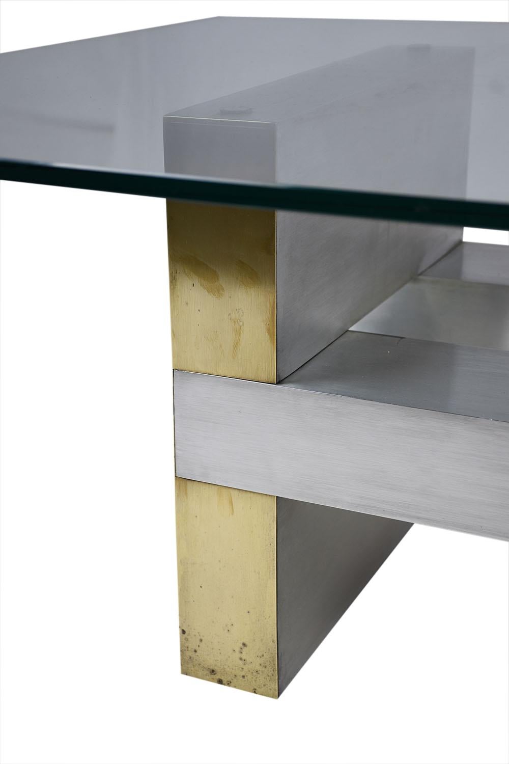 Immerse yourself in the timeless elegance of Mid-Century Modern design with our exquisite 1960s coffee table, intricately crafted to embody the iconic style of the renowned designer, Paul Evans. This breathtaking piece serves as a testament to