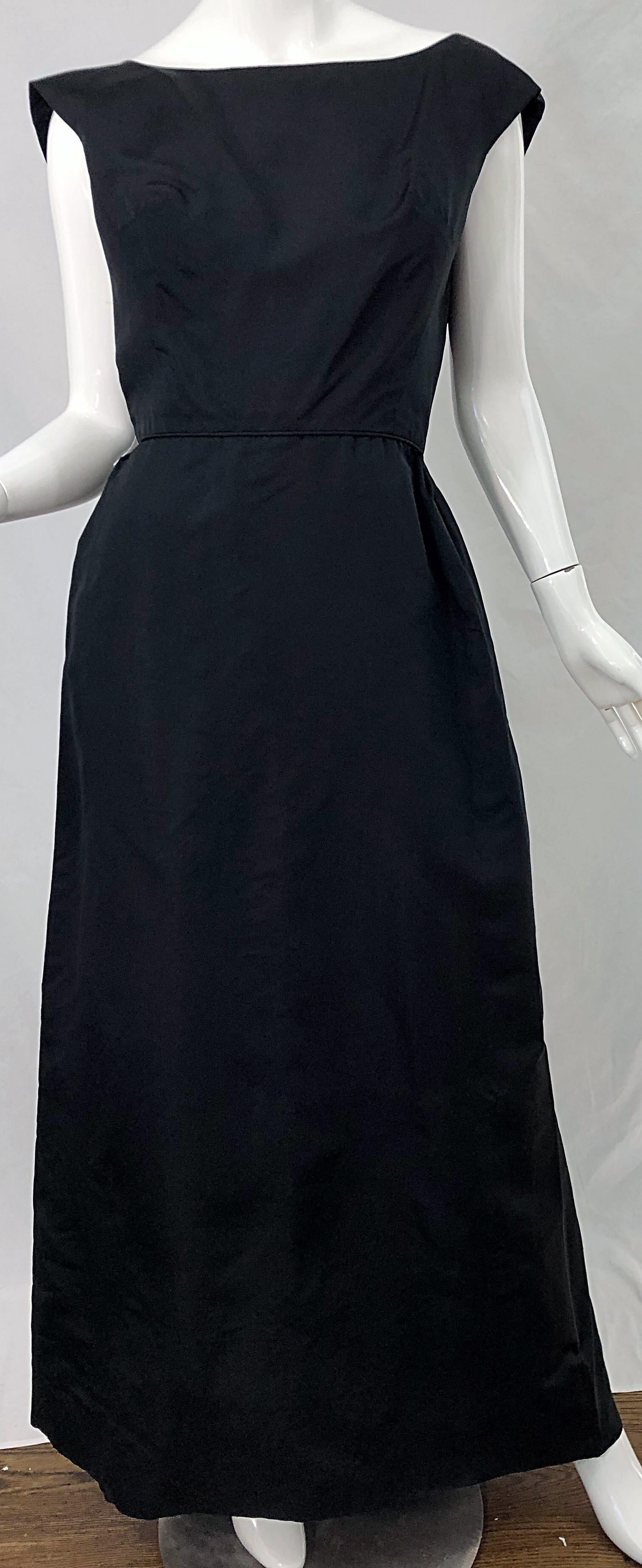 Beautiful and classic PAULINE TRIGERE black silk taffeta gown / evening dress ! Features a tailored bodice with a full skirt. Open back reveals just the right amount of skin, and has tuxedo style buttons and a hidden metal zipper. Has a slight train