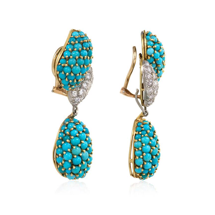A pair of pavé turquoise and diamond earrings with swirl form tops and removable turquoise-set pendants, in platinum and 18k gold.  Atw. 1.00 ct. diamonds.  Numbered 742