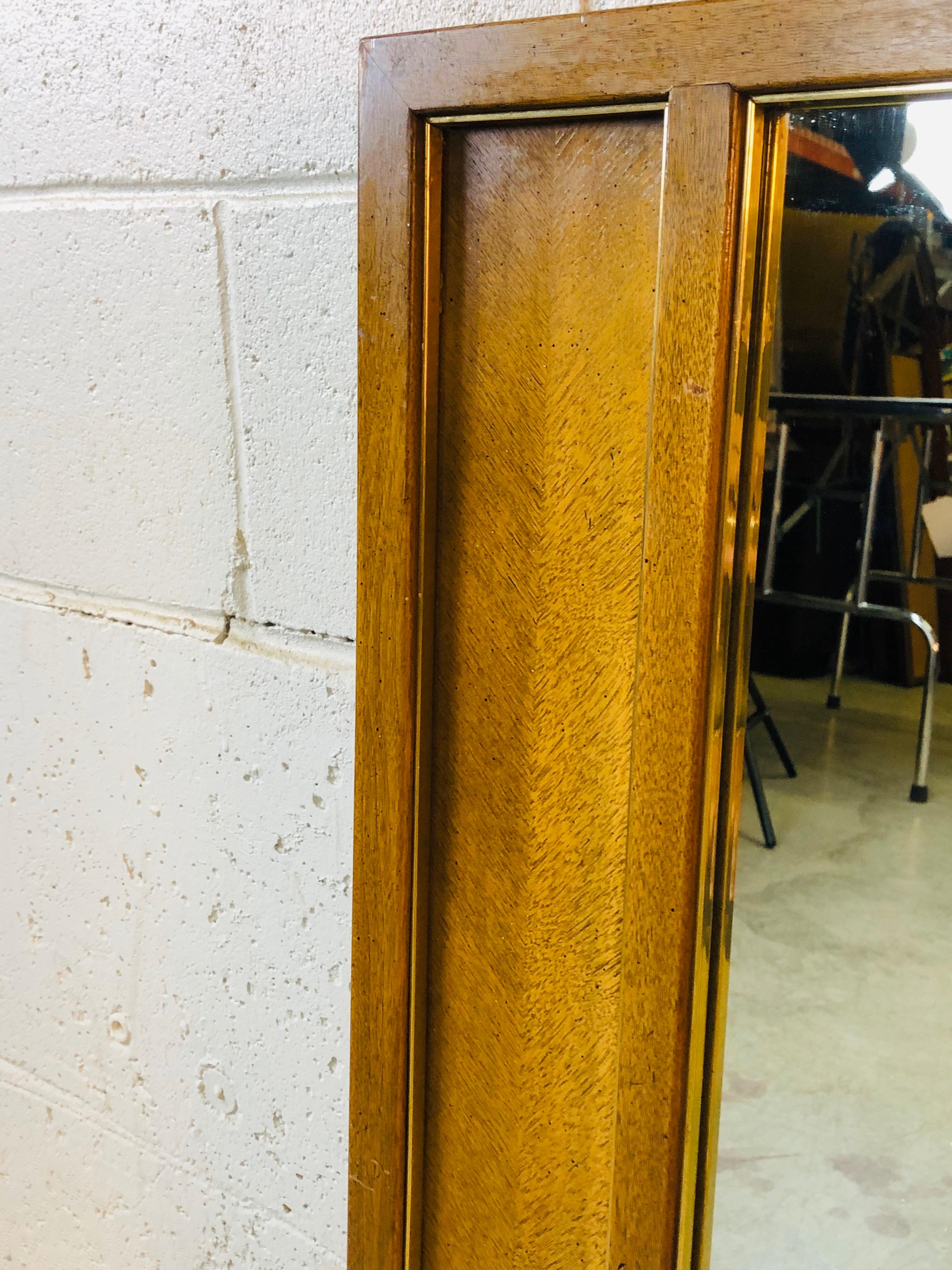 Mid-Century Modern 1960s Pecan Wood Framed Mirror with Gold Metal Accents For Sale