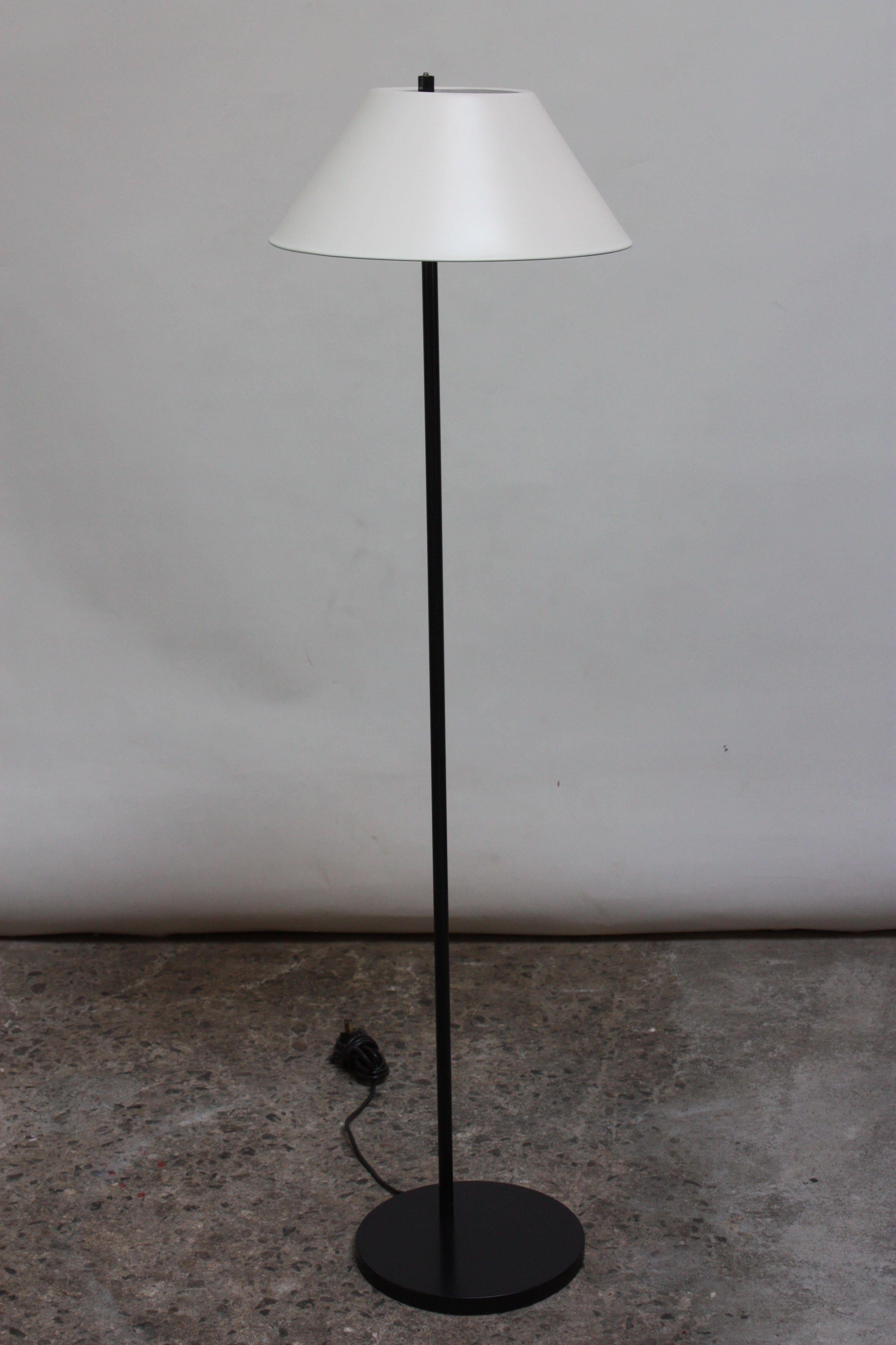 An early example (circa 1967, Denmark) of Per Iversen's 'Combi' Lamp for Louis Poulsen (model #28917). Composed of an all original black painted-metal stem, top cap, and base with restored shade in off-white painted-metal (color matched to the