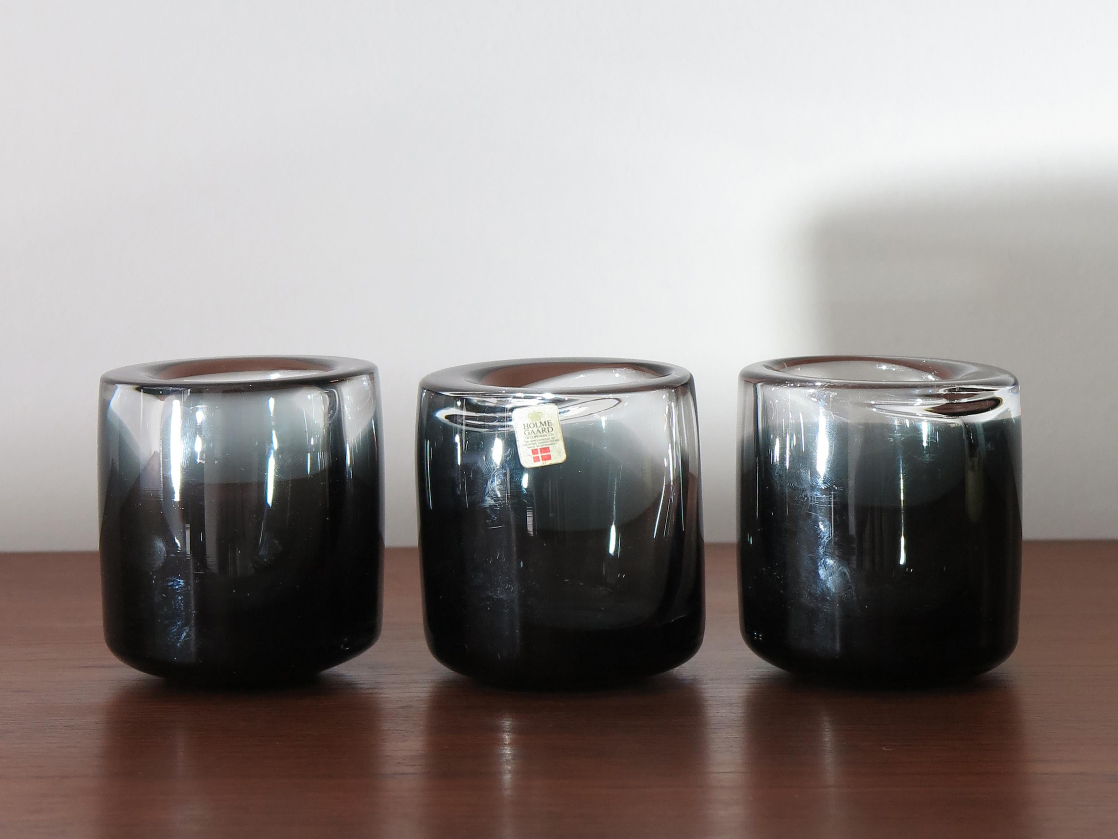 Set of three original Danish Mid-Century Modern glasses designed by Per Lutken for Holmegaard with manufacture label, circa 1960s.

Please note that the set is original of the period and this shows normal signs of age and use.
Literature:.