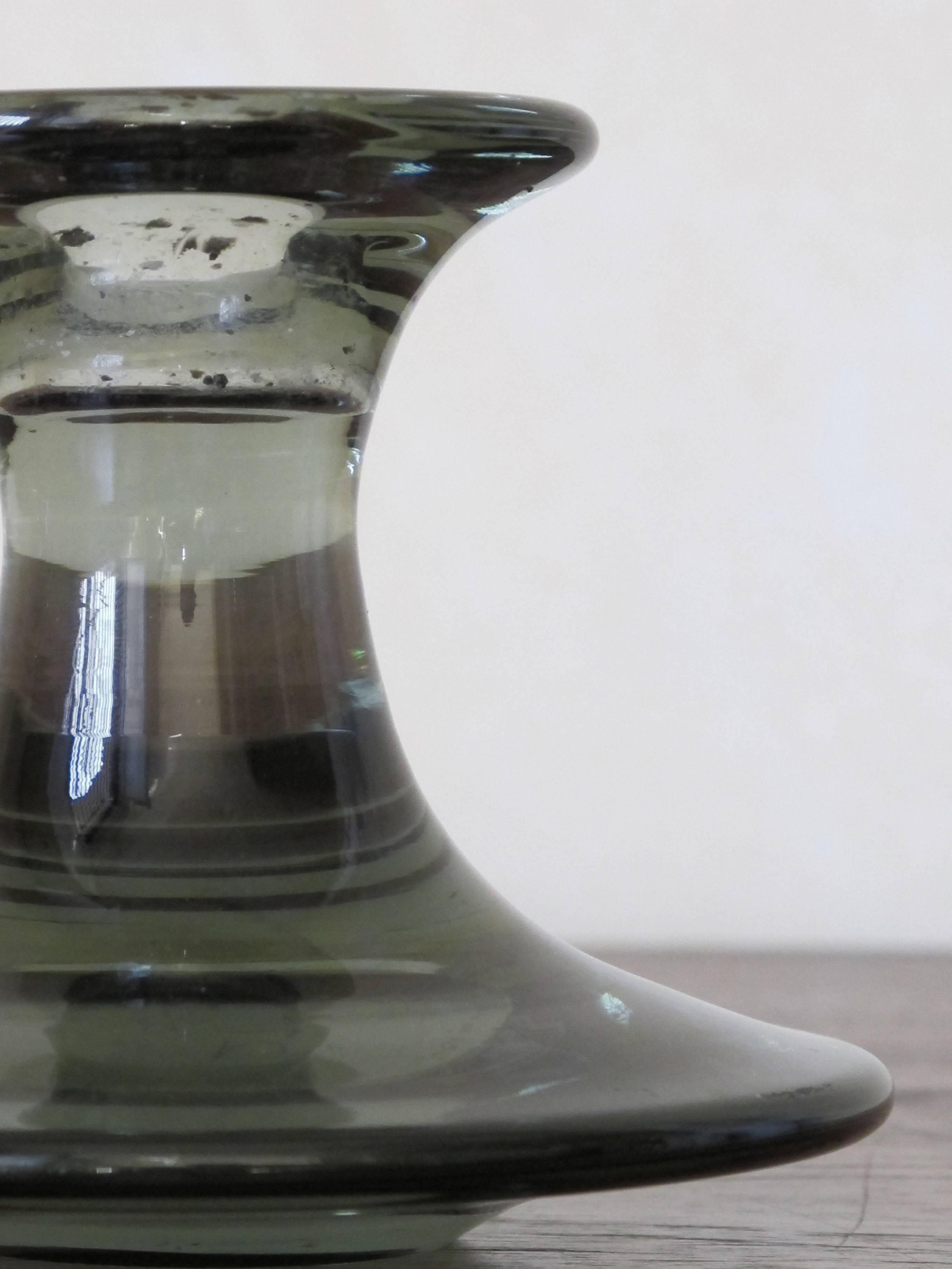 Pair of Danish Mid-Century Modern glass candleholder designed by Per Lutken and production by Holmegaard, circa 1960s.