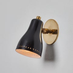 1960s Perforated Black and Brass Wall Lamp Attributed to Jacques Biny
