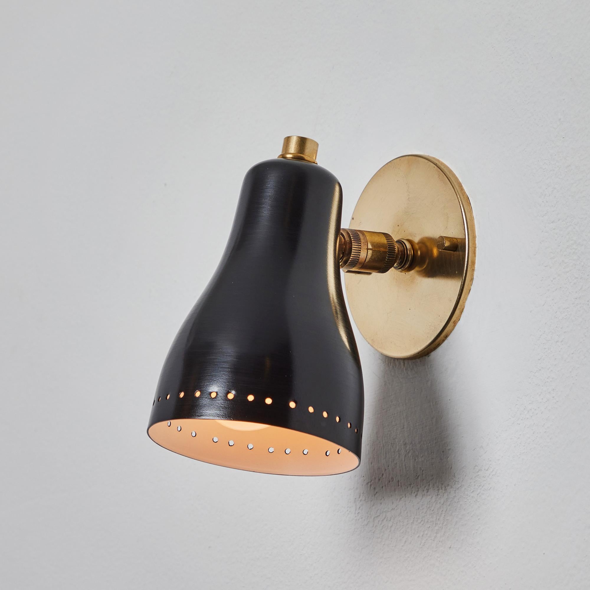 Mid-Century Modern 1960s Perforated Black and Brass Wall Lamp Attributed to Jacques Biny
