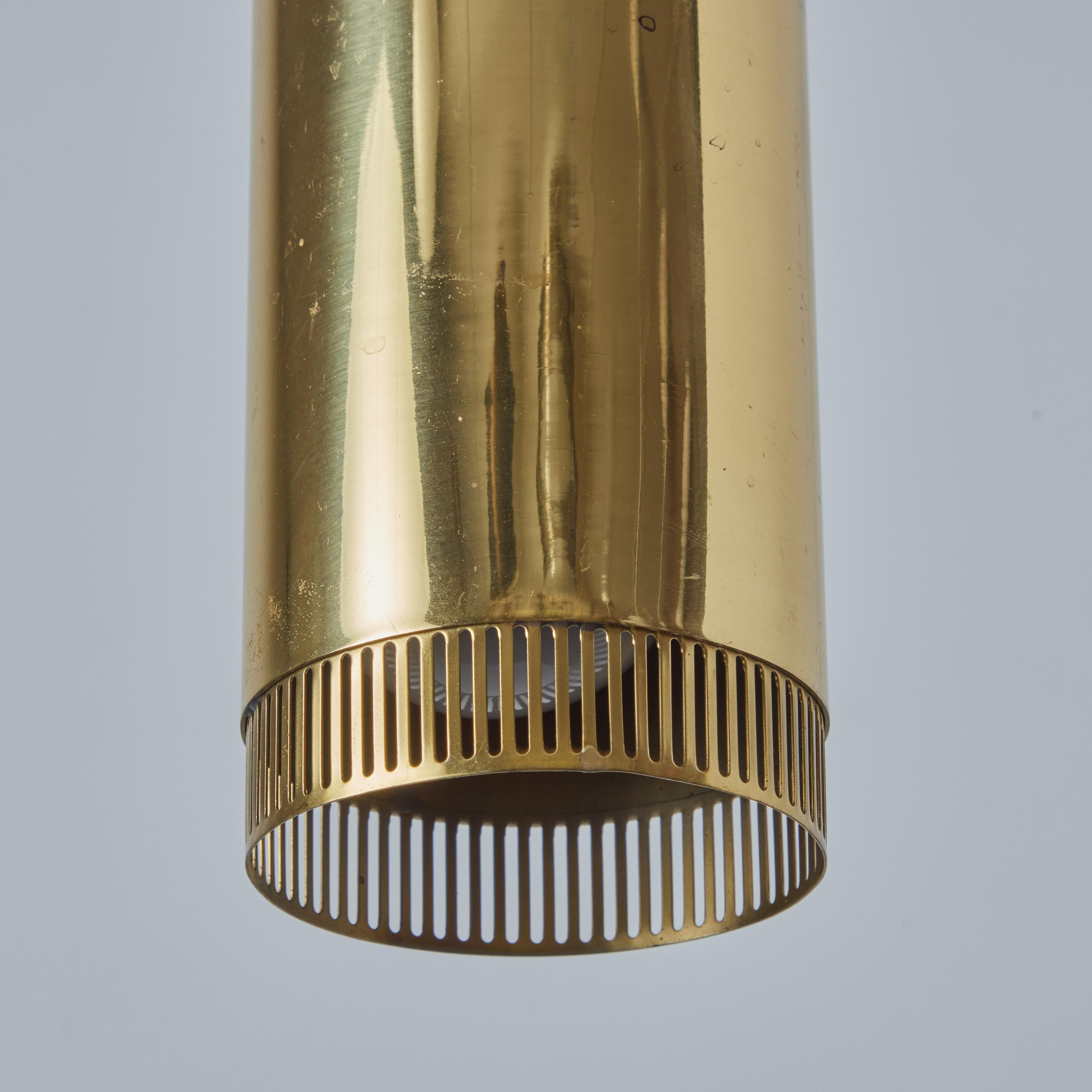 Mid-20th Century 1960s Perforated Brass Cylindrical Pendant Attributed to Mauri Almari for Idman For Sale