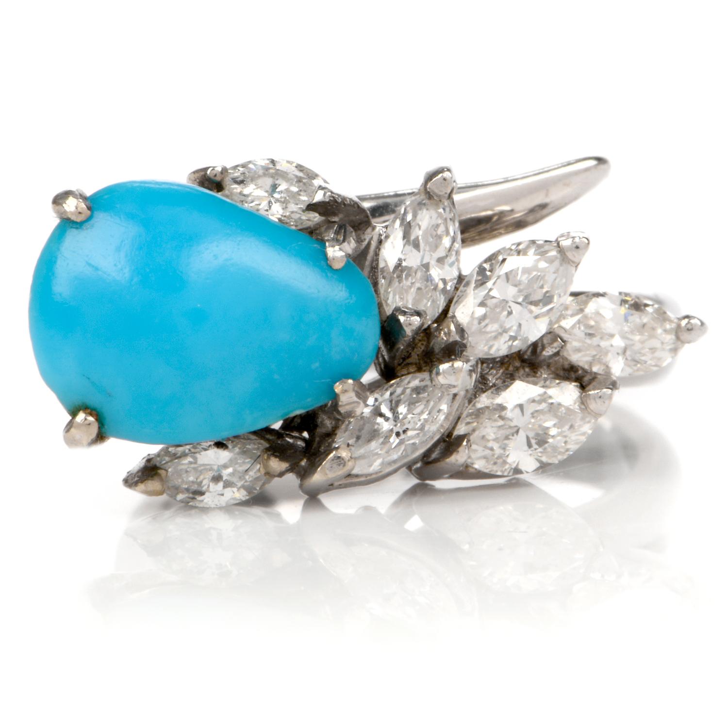 This chic circa 1960s botanically inspired Persian turquoise and diamond cocktail ring is crafted in solid 18 karat white gold, weighing 6.1 grams. Centered with one prong-set pear shaped cabochon finest quality Persian turquoise. Alongside seven