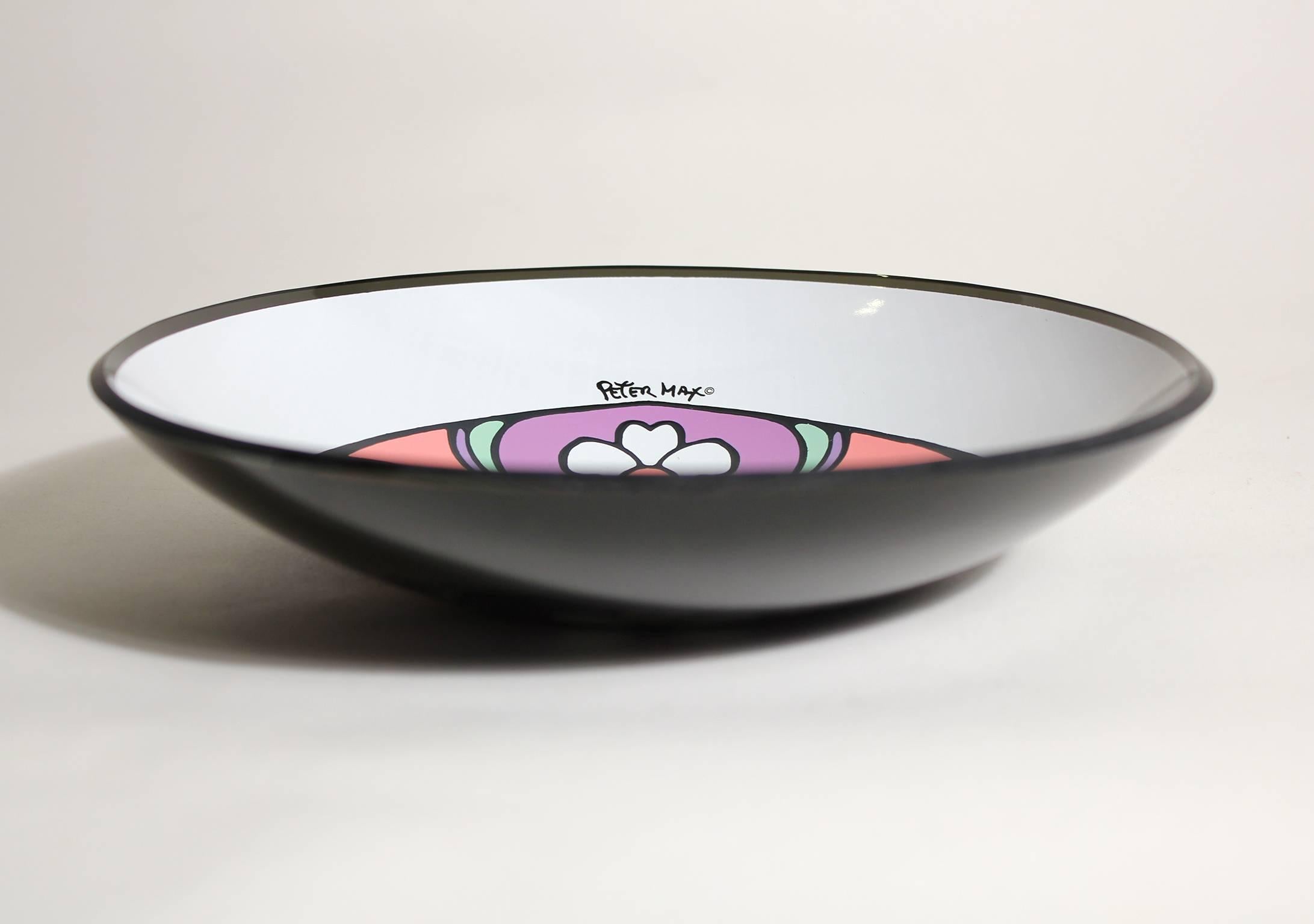 Great pop-art Peter Max glass bowl. In excellent shape with no condition issues. Measures 7