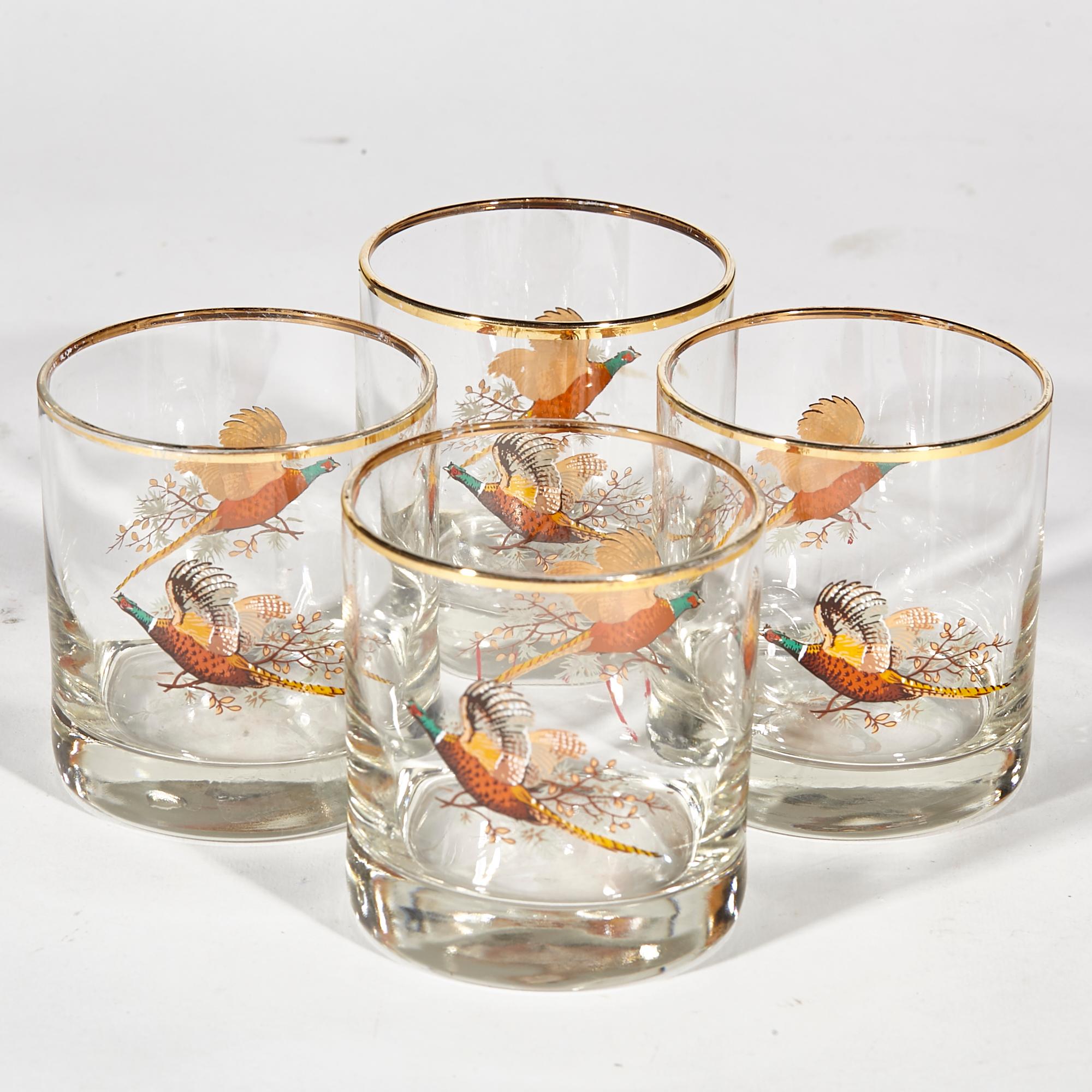 Vintage 1960s set of four pheasant glass bar tumblers with gilt rim accents. Light wear to rims. No maker's mark.