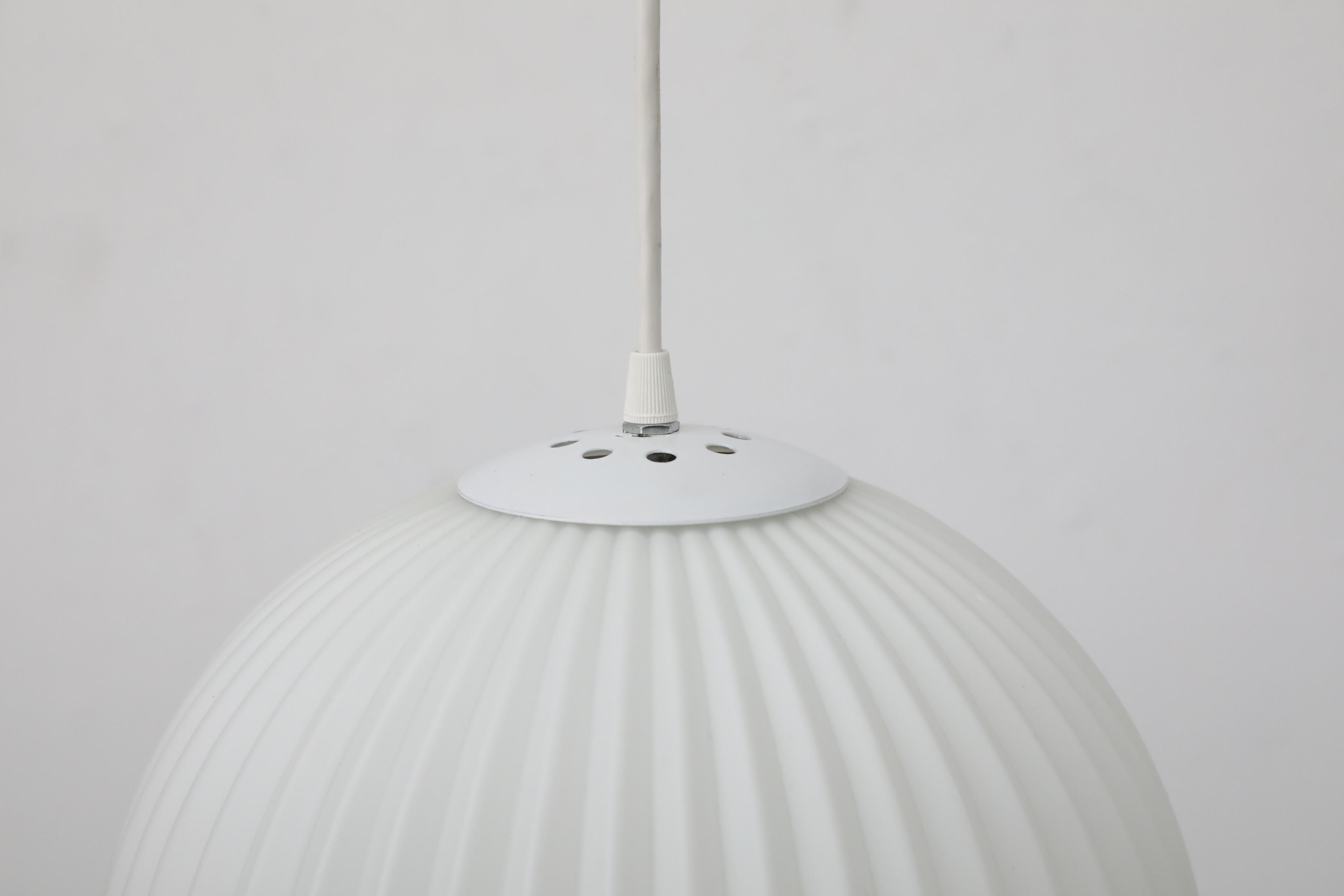 1960s Philips Attributed Ribbed Milk Glass Globe Pendant Light In Good Condition In Los Angeles, CA