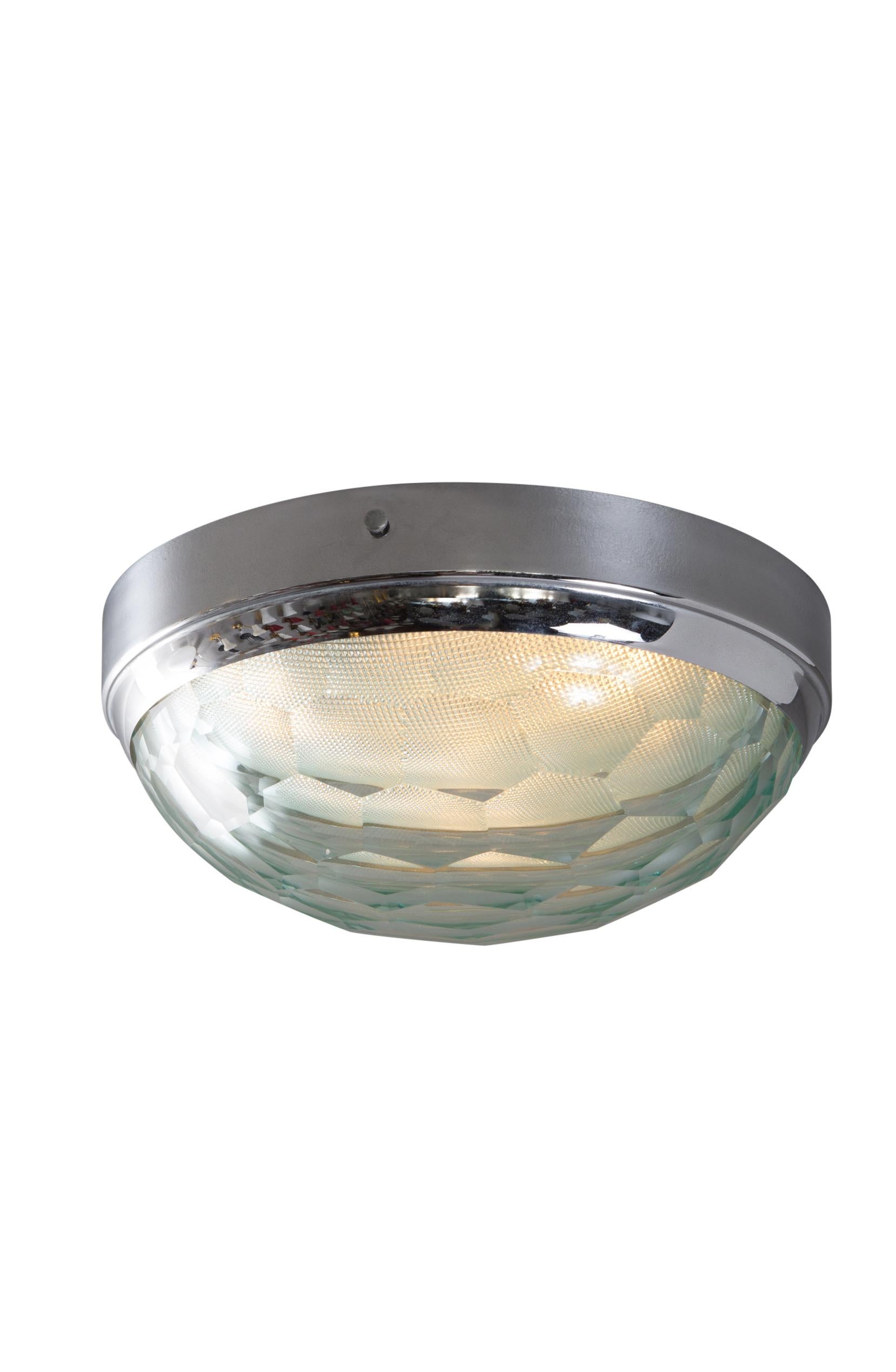 Large 1960s Pia Guidetti Crippa multifaceted wall or ceiling light for Lumi. Executed in chromed metal with two glass elements, a multifaceted outer glass and green tinted and textured inner glass. An incredibly sculptural and refined focal point of