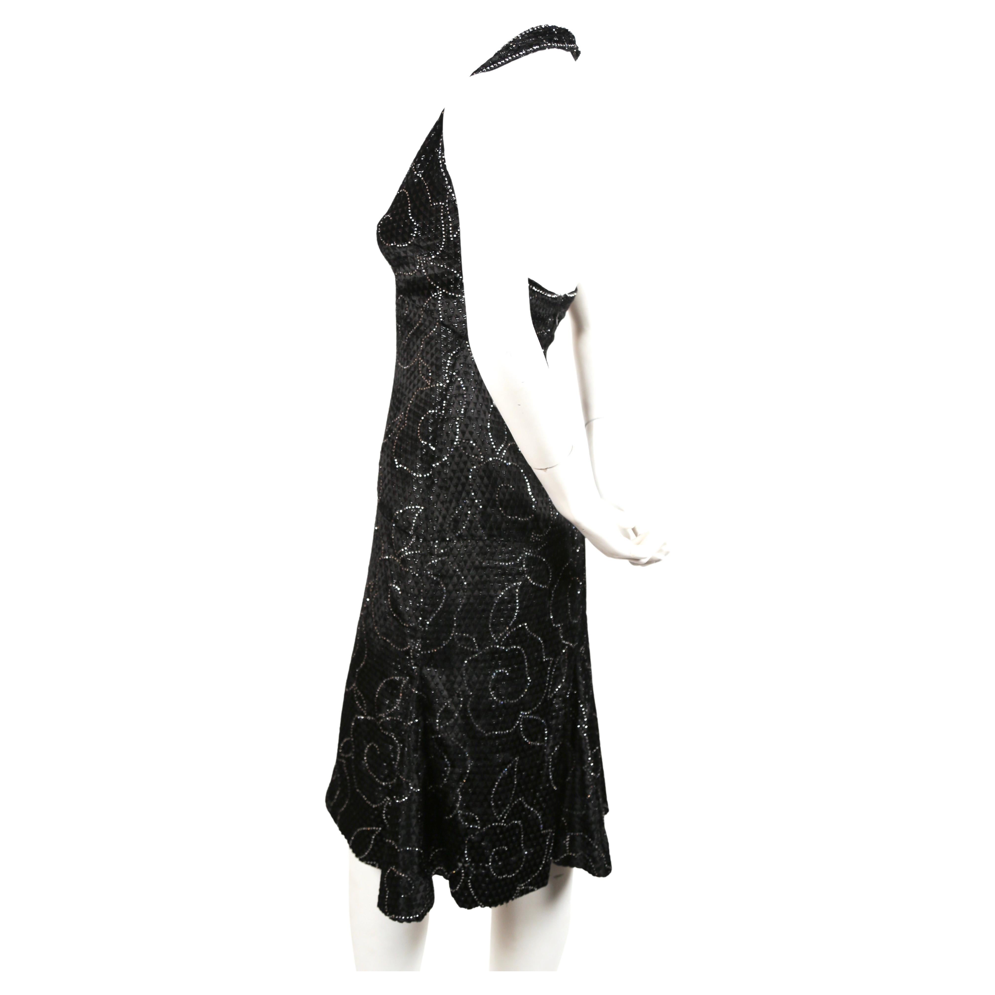 Very rare, haute couture, silk velvet dress with rhinestones from Pierre Balmain dating to the 1960's. Fabric is a cut silk velvet with an interesting diamond shaped pattern throughout. Dress best fits a US size 2-4 (short waisted). Dress measures