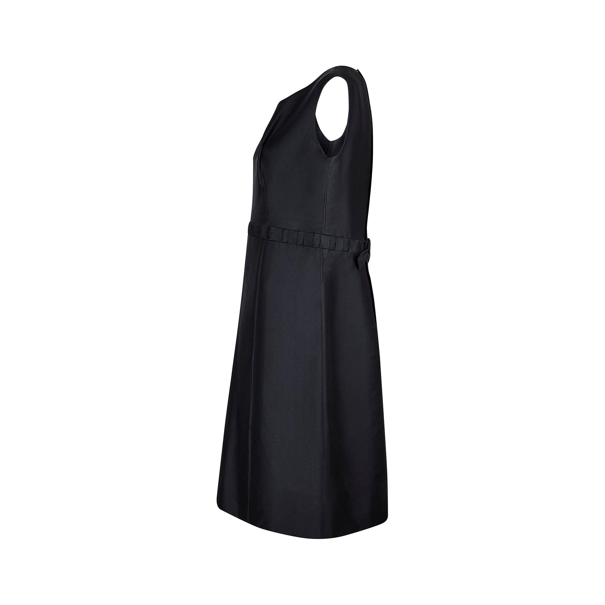 This elegant shift dress was created by Pierre Balmain in his 1960s heyday. Extolled for the sculptural quality that characterises his work, Balmain lovingly described dressmaking as 