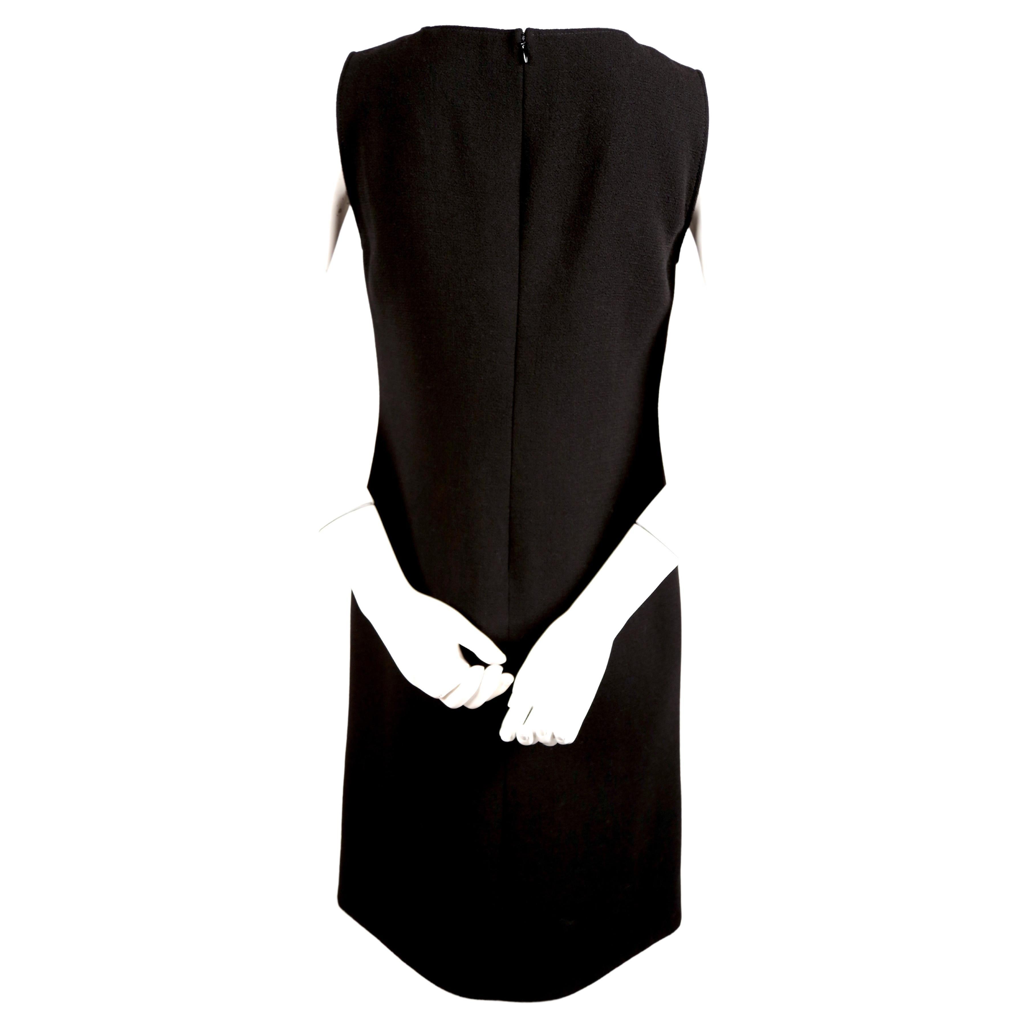 Women's or Men's 1960's PIERRE CARDIN haute couture wool shift dress with circular cut-outs