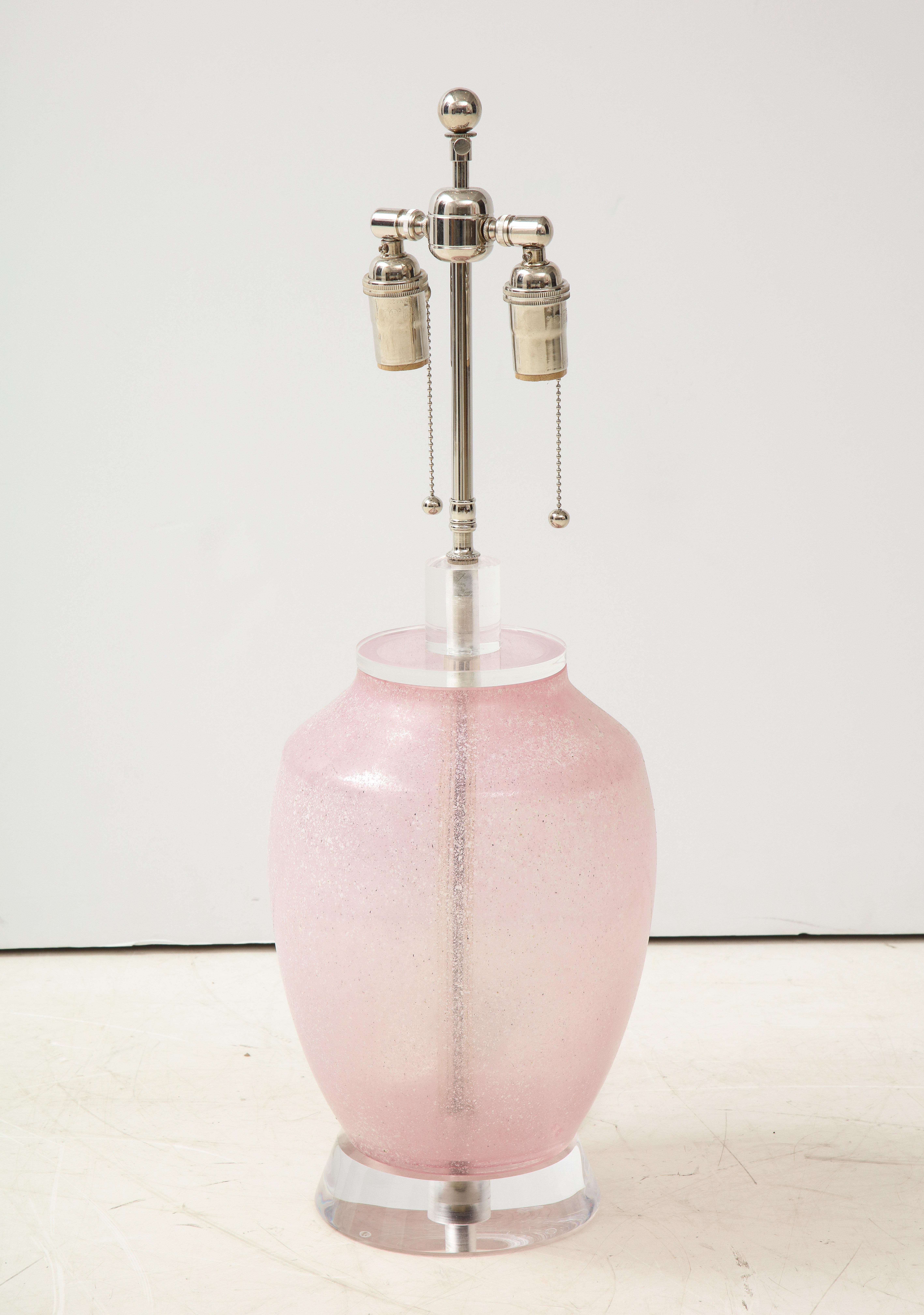 Large 1960's Cenedese lamp.
The pink lamp body which has a frosted textured finish sits
on a thick lucite base and has been Newly rewired with an adjustable 
polished nickel double cluster that takes standard light bulbs.