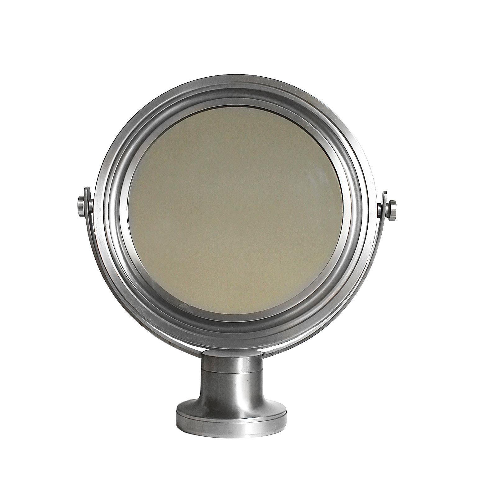 Pivoting vanity-table mirror, brushed nickel-plated frame and base. Original patina.
Design: Sergio Mazza
Italy, late 1960s.