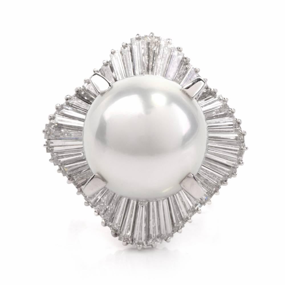 This captivating vintage ballerina design cocktail ring is crafted in solid platinum and weighs approximately 19.1 grams. It is centered with a lustrous south-sea pearl approx.14mm silver white tone. The ballerina pattern is composed approx genuine