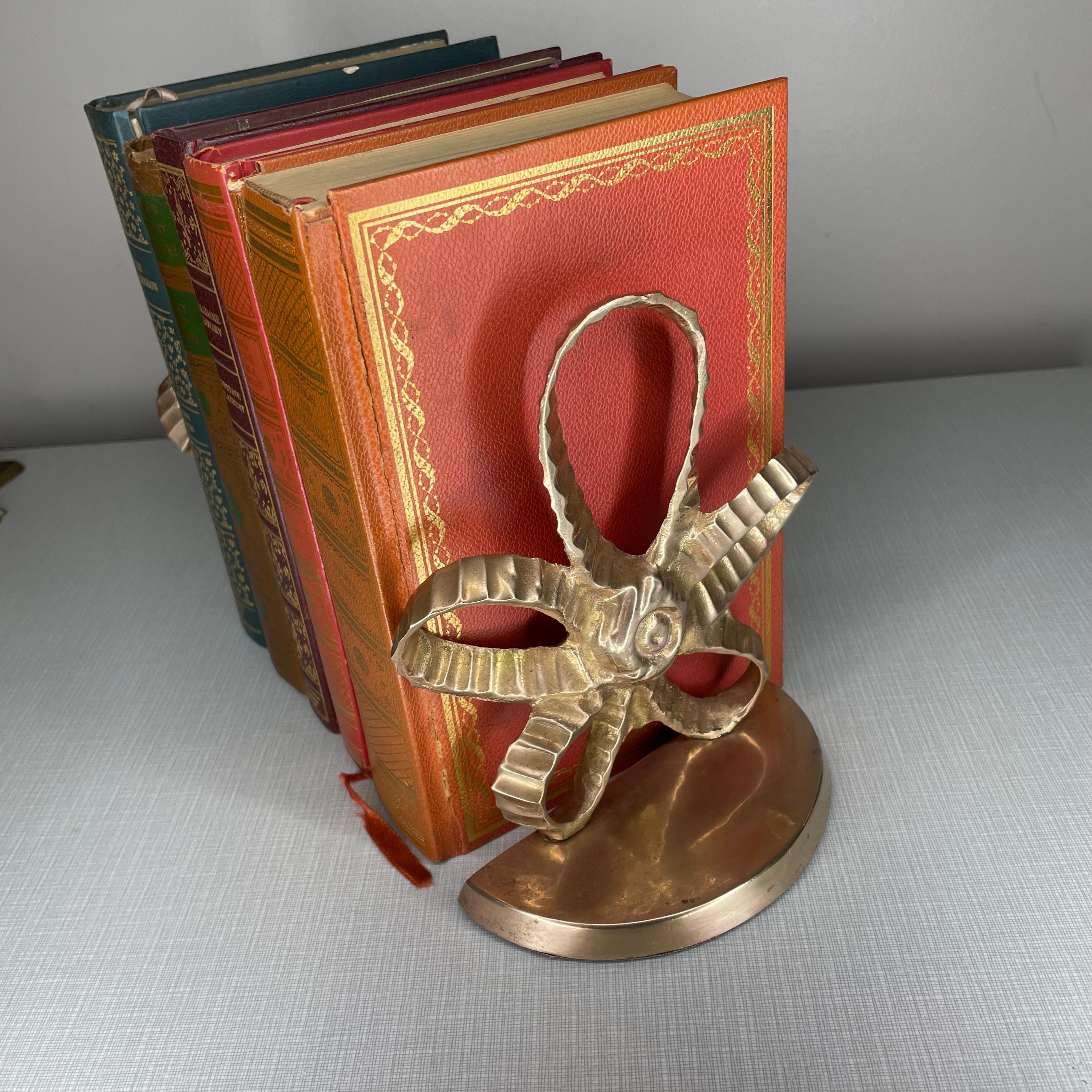 Indian 1960s Polished Brass Star Bookends, a Pair For Sale
