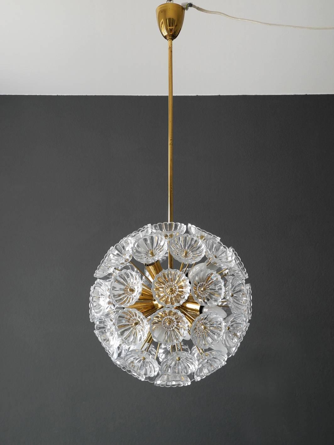 Very rare 1960s Pop Art Space Age Sputnik brass glass flower ceiling lamp.
Beautiful design for a great light experience.
Very good vintage condition without damages. 
All glasses complete and without any damages.
Twelve E14 sockets. 100%