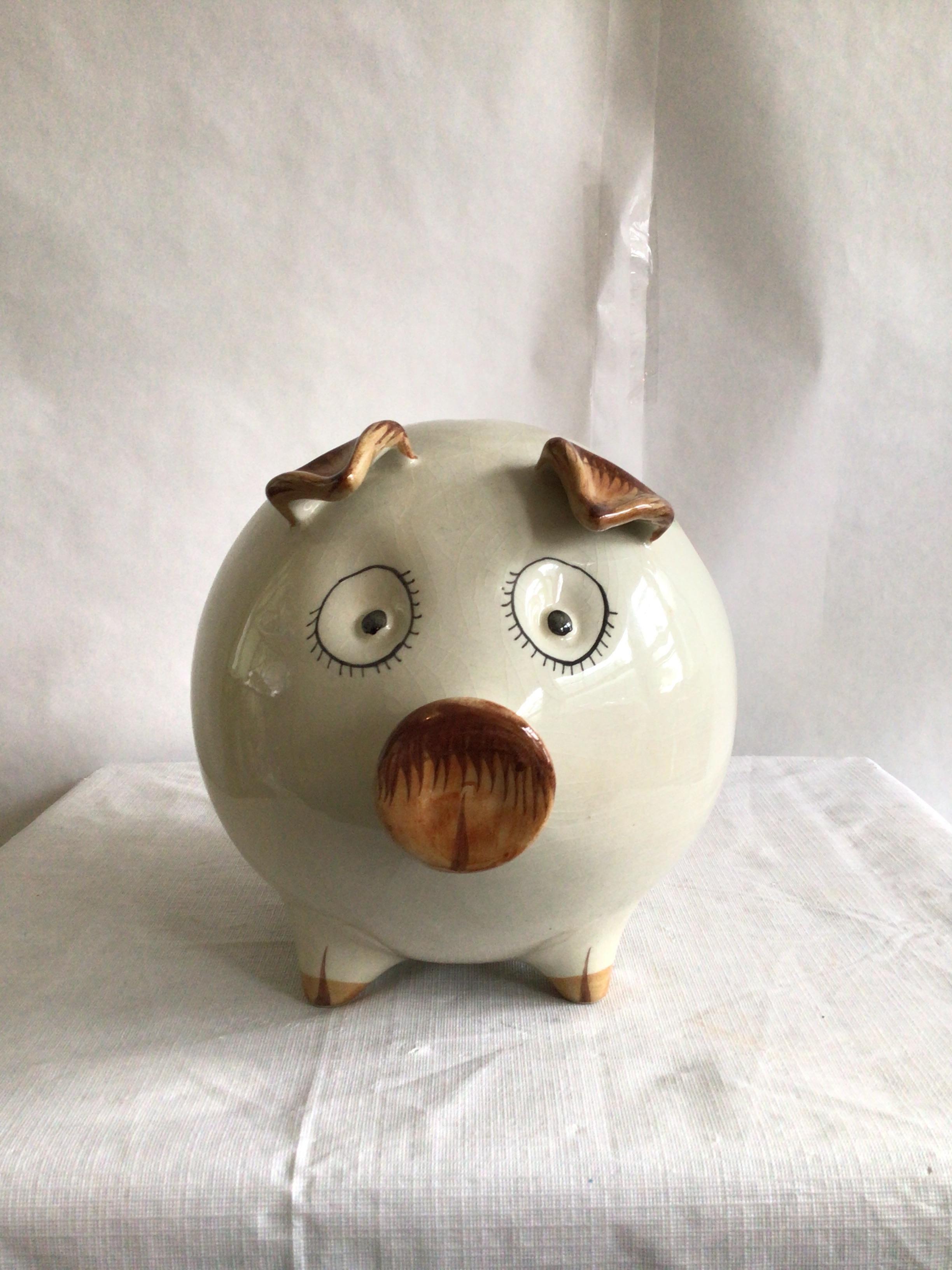 1960s Portugese Glazed Ceramic Painted Piggy Bank
Stopper at bottom included
Stamped: Made in Portugal
Pink and Yellow hand-painted floral motif