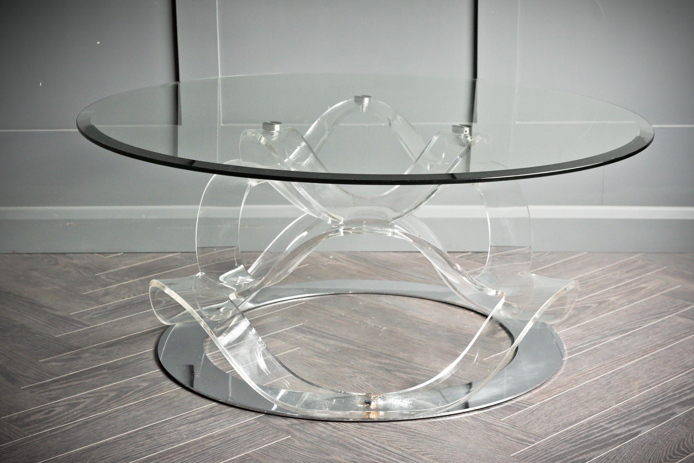 Striking pressed Lucite coffee table with the design being typical of the 60's.