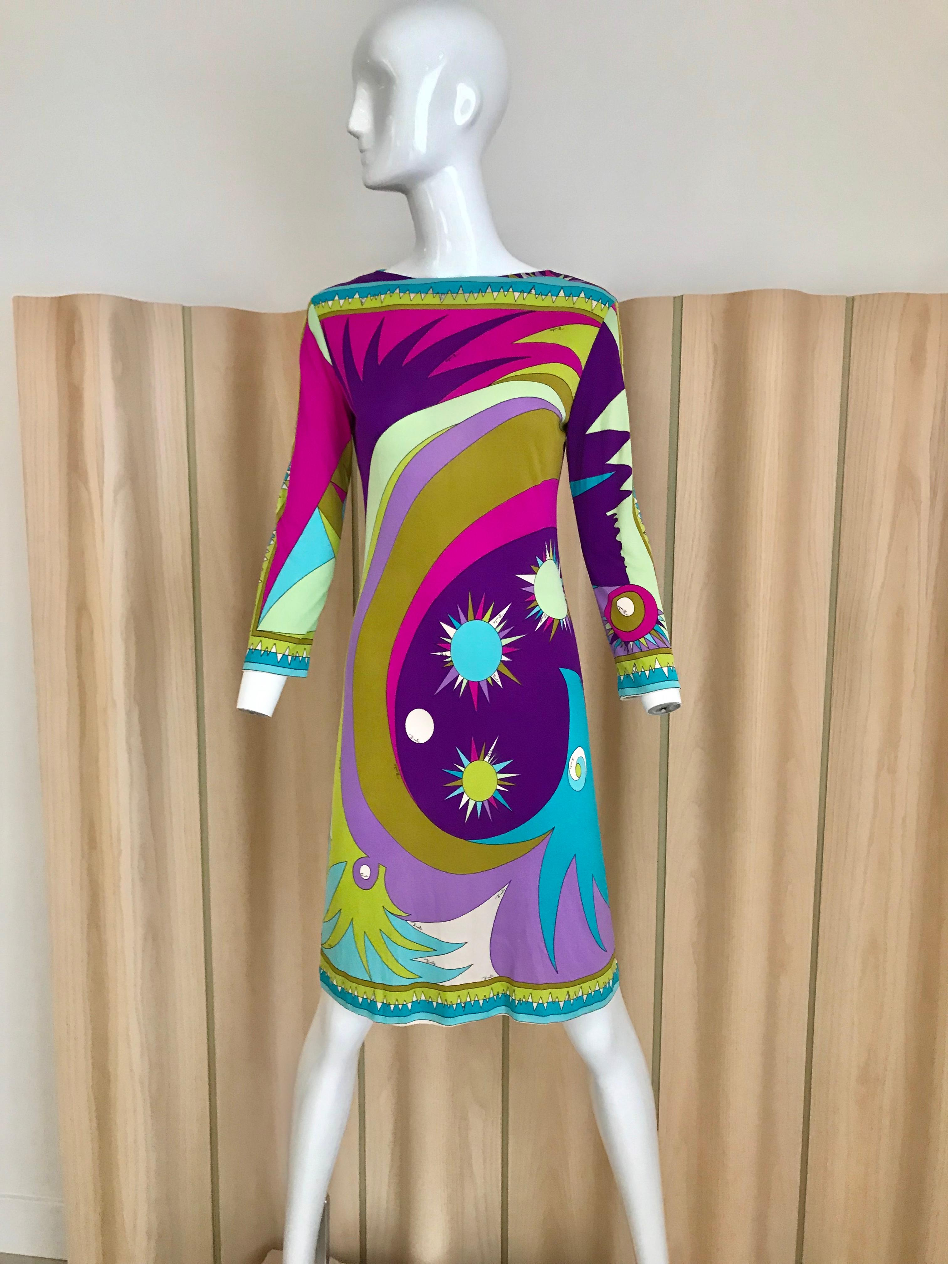 1960s soft silk jersey Pucci vintage dress in purple, magenta, pink, green psychedelic knee length long sleeve print.
Bust; 34 inches/ Hip : 34 inches