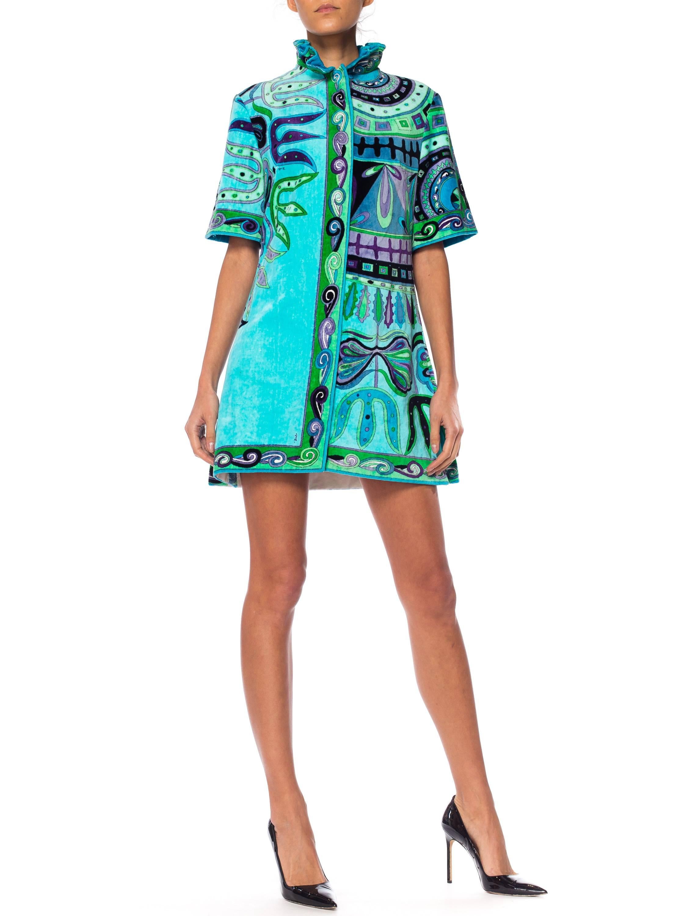 Perfect for throwing on over your bikini or for wearing after the shower. A fun dress too on its own worn with white shorts and flats for summer cocktails. Zips all the way open down the front and can be worn as a long beach coverup as well. Tagged