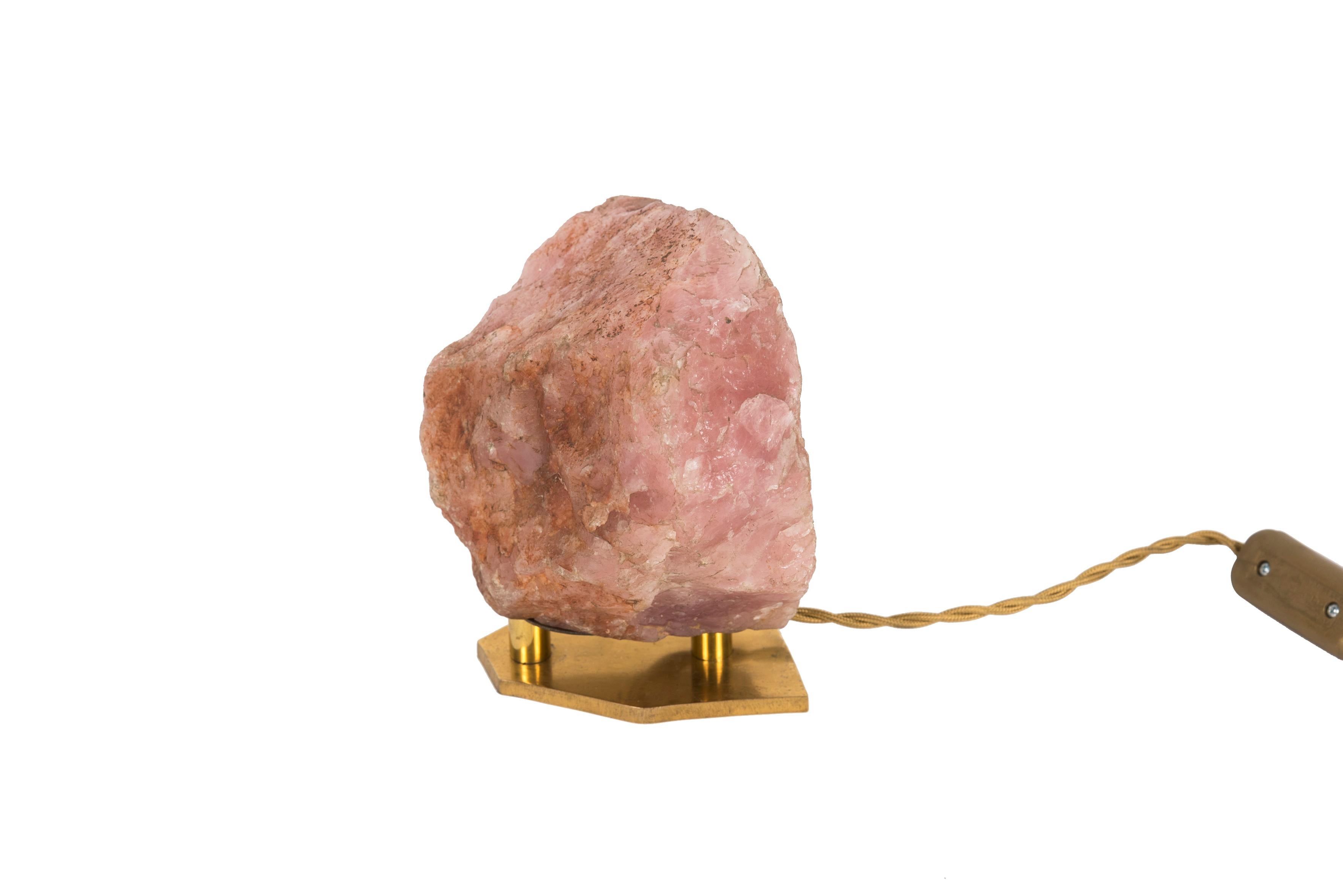 Very nice table lamp with a pink quartz in the style of Jean-Michel frank
Bronze base.