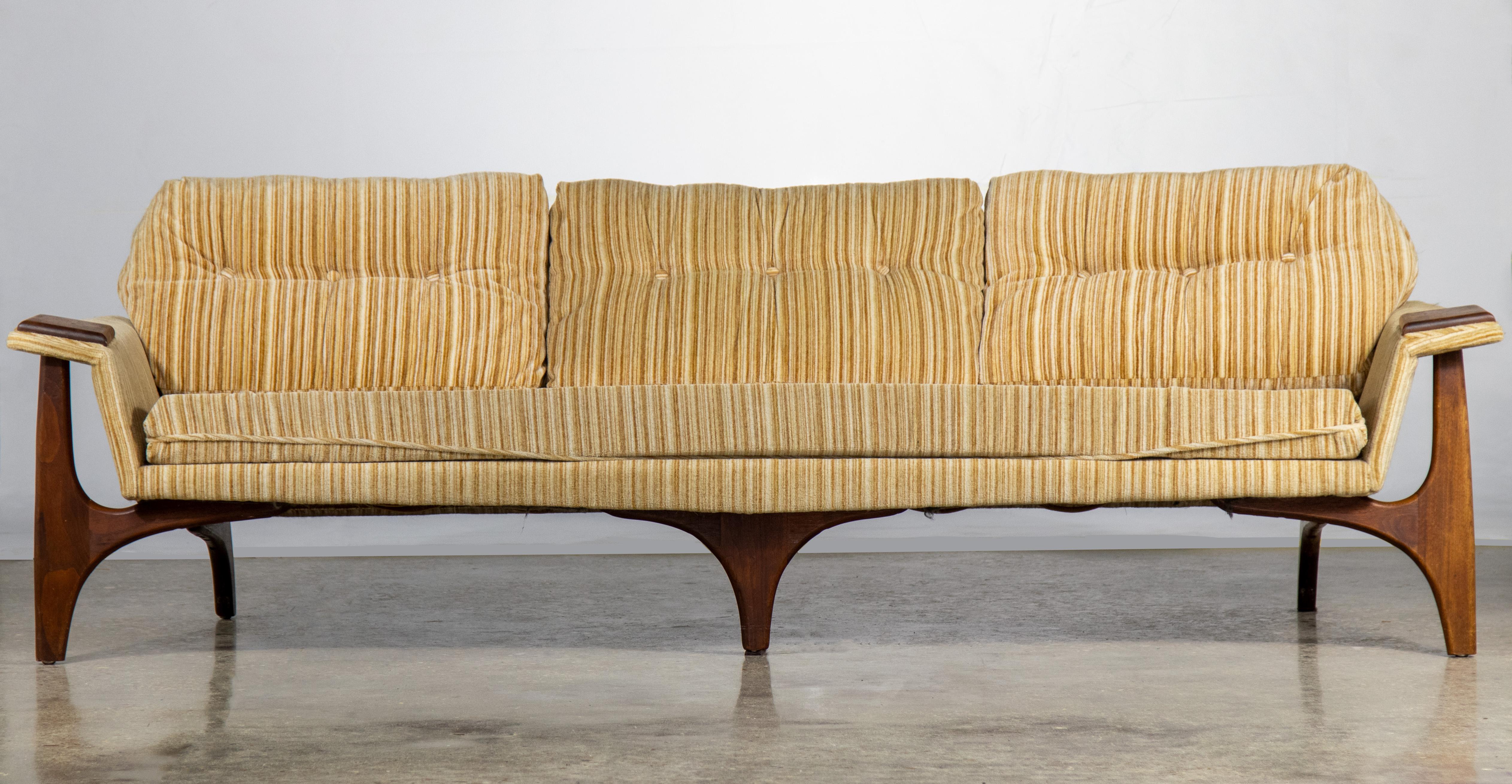 A rare 1960's Adrian Pearsall Sofa for Craft Associates. This sofa does not appear in the catalogue and there are only one or two other examples on the internet. Walnut paws lend well with the Scandinavian aesthetic. Sofa appears to float off the