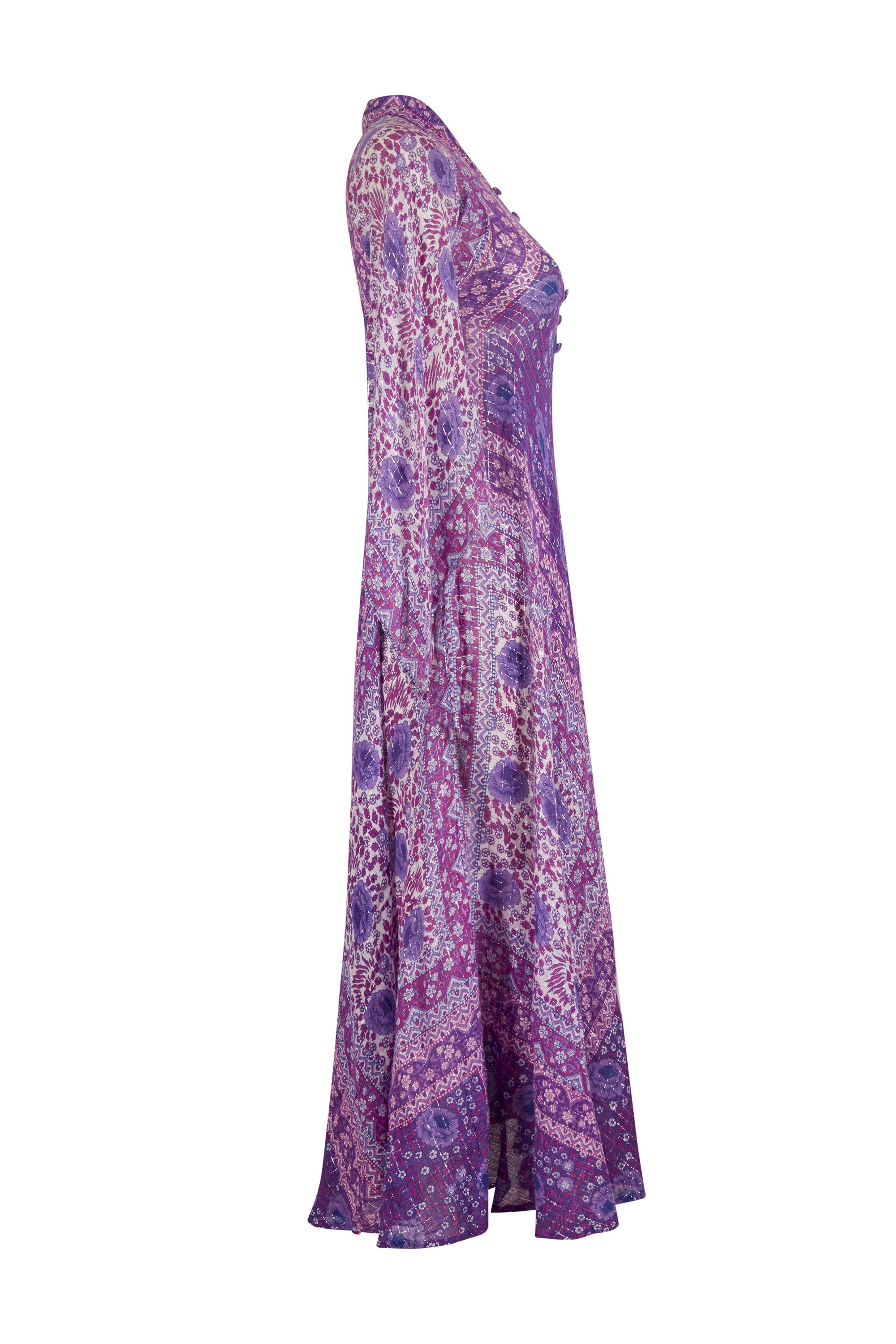 This 1978 purple cotton Sultana kaftan is by Adini, from the Holiday Collection is the most sought after manufacturer of these iconic dresses and is a rare find in exceptional vintage condition. The dress is comprised of hand block printed Indian