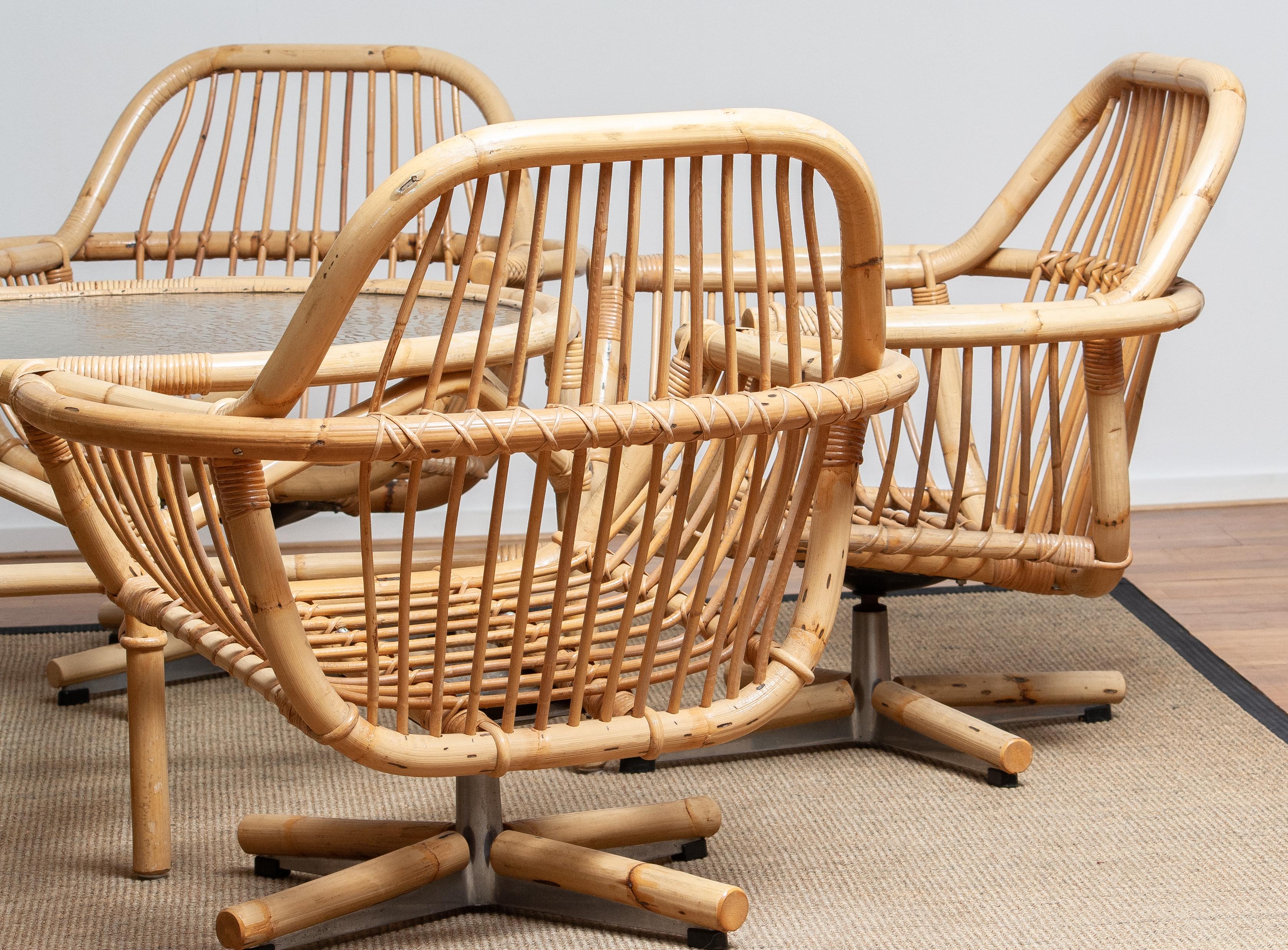 Swedish 1960s Rattan Garden Set / Lounge Set Consist Five Swivel Chairs and Coffee Table