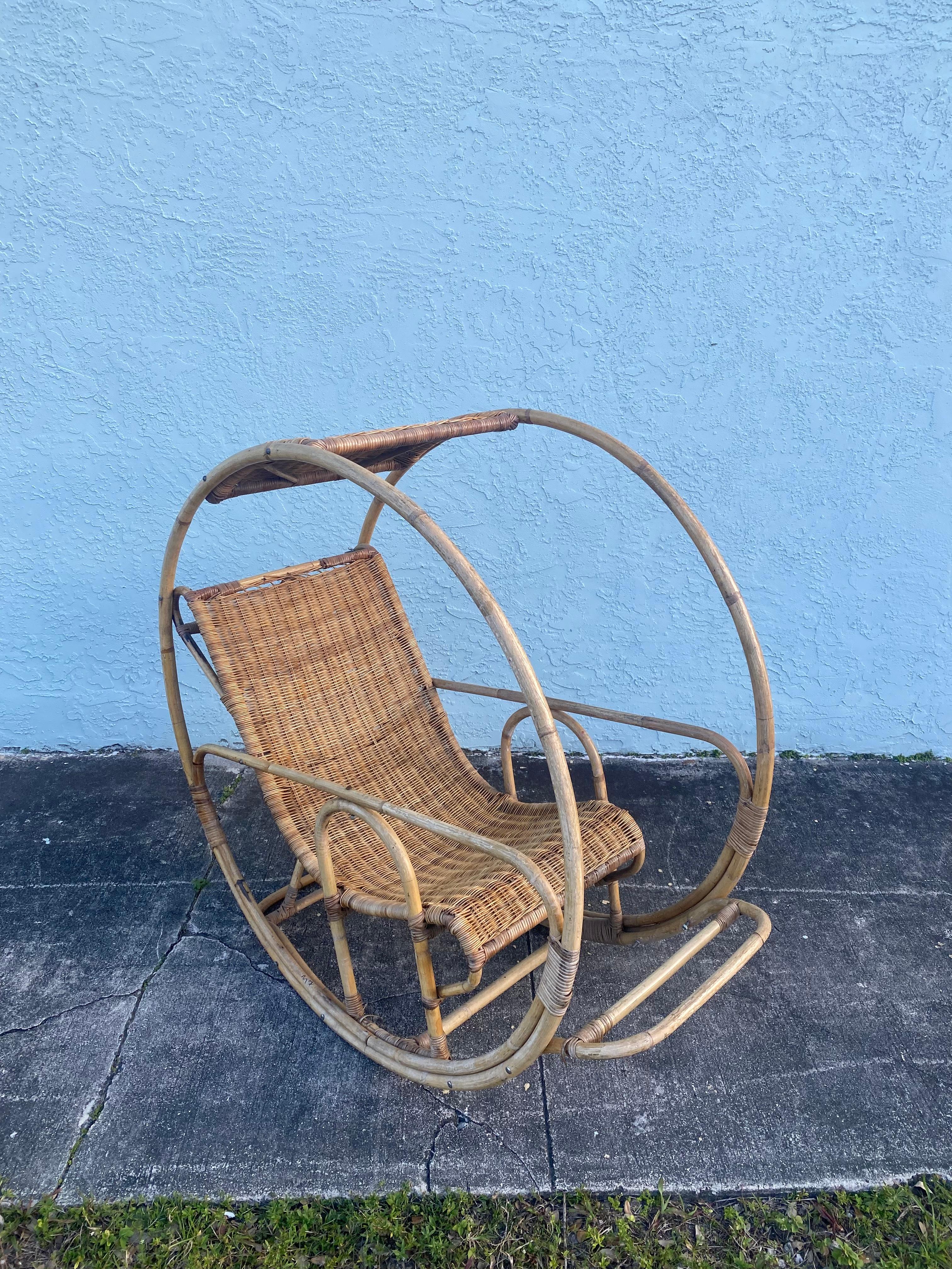 Italian 1960s Rattan Wicker Sculptural Round Rocking Chair For Sale