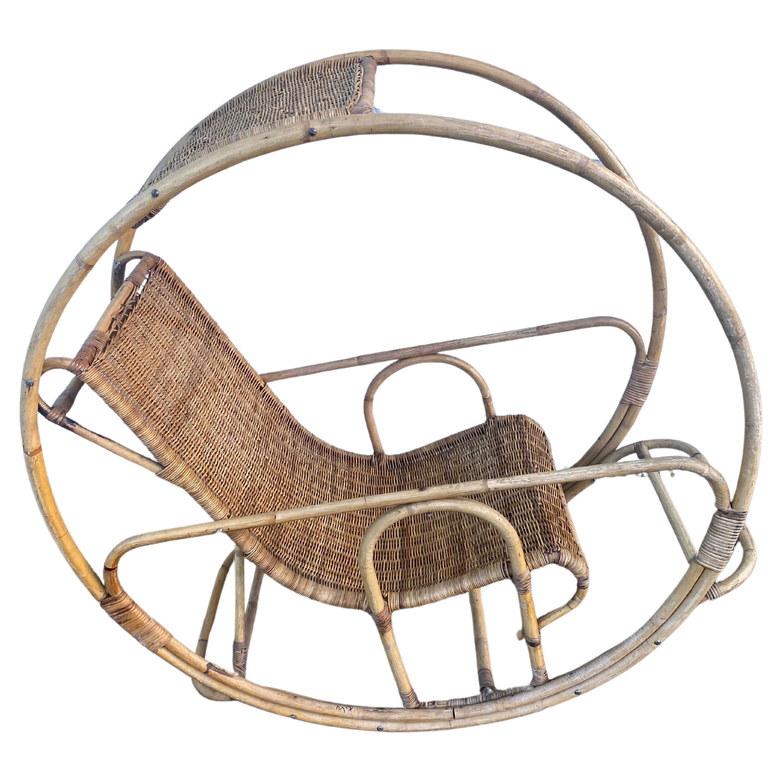 1960s Rattan Wicker Sculptural Round Rocking Chair For Sale
