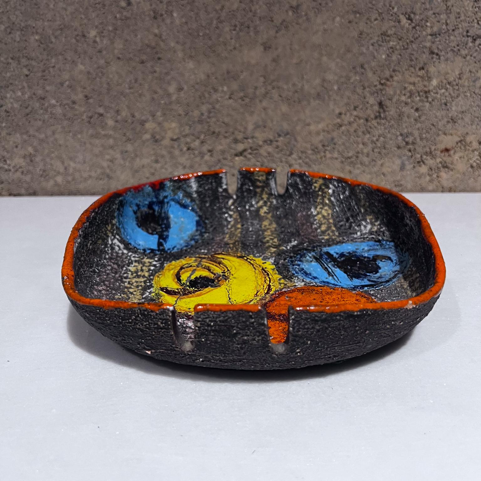 1960s Modern Italian Colorful Ashtray
attributed Alvino Bagni for Raymor
Stamped Italy
1.5 h x 7.75 x 7.75
Unrestored original vintage preowned condition
Ashtray has a crack.
Review all images as provided.