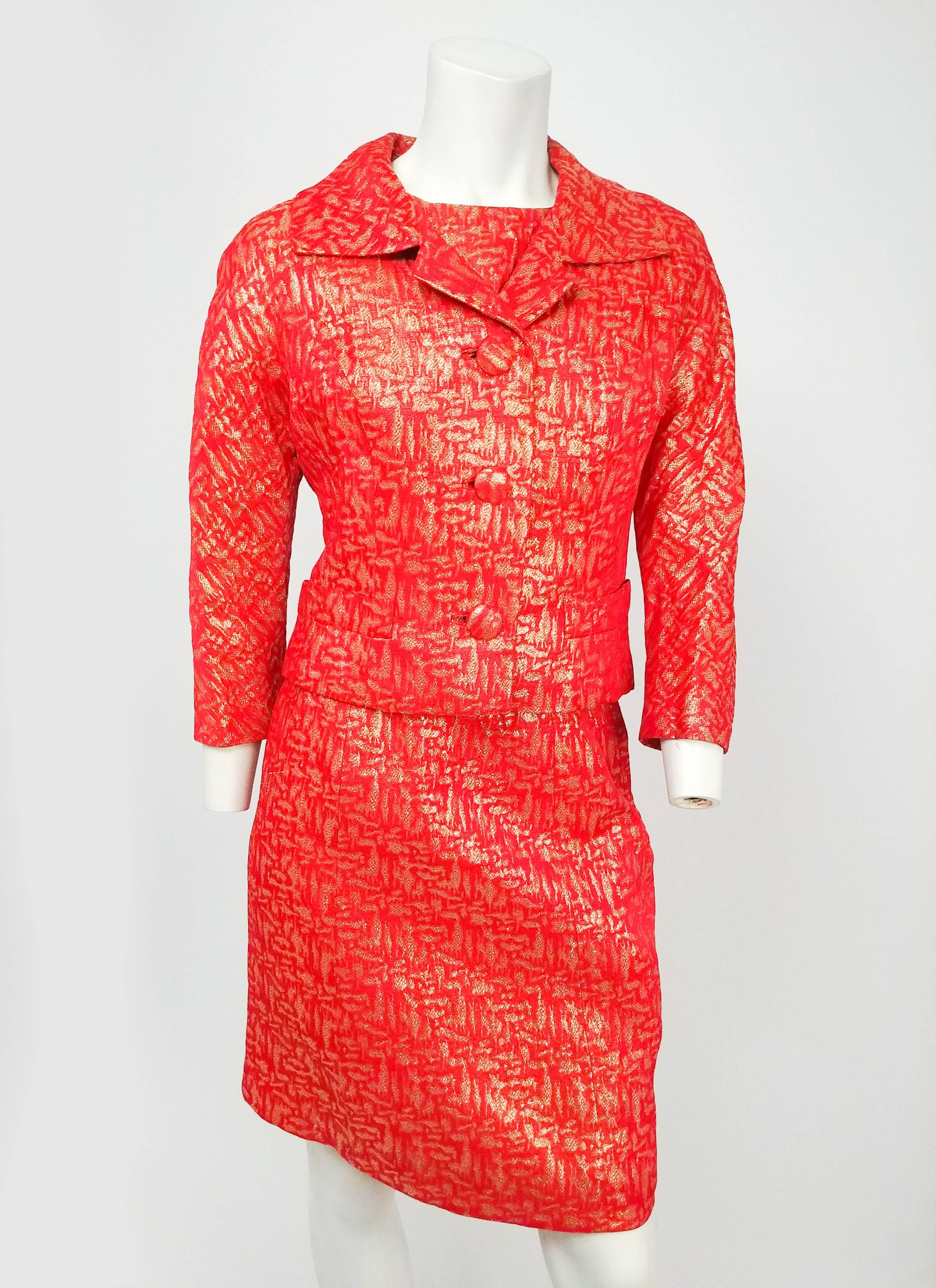 1960s Red & Gold Brocade Jacket, Top, & Skirt Suit Set. Matching three piece set in red with metallic gold thread woven throughout. Jacket has traditional notched collar and buttons down front with covered buttons, glove length sleeves. Short sleeve