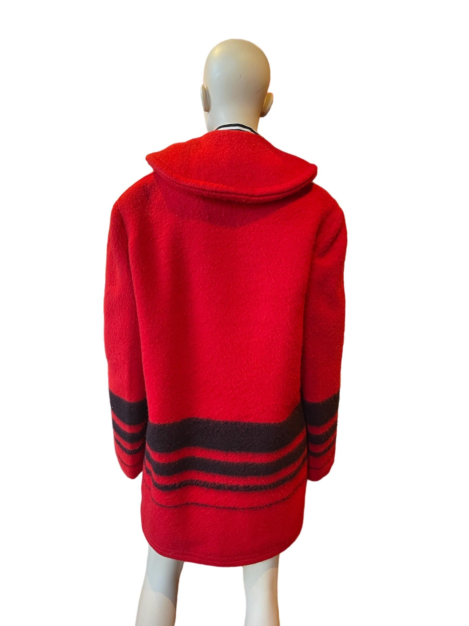 1960s Red and Black Buck Skein Brand Thermalized Wool Coat, Weather Control Lining

A beautiful red and black thermalized wool coat. Small holes on hood and elbow. 
