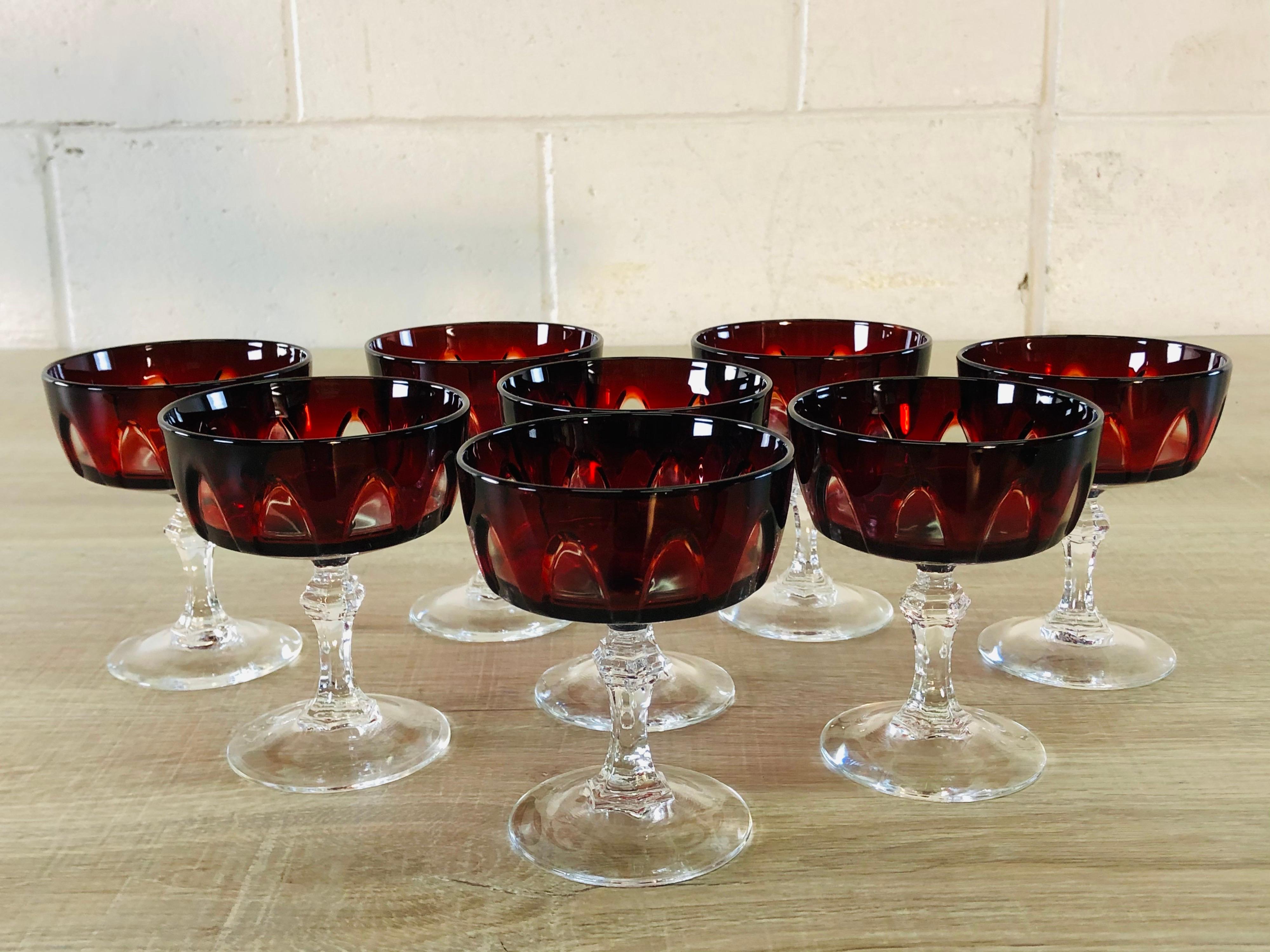 Vintage 1960s set of 8 French glass red and clear arched style coupe stems. Marked France.
