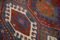 Tappeto turco vintage rosso e blu degli anni '60, 4'3" x 7'7"