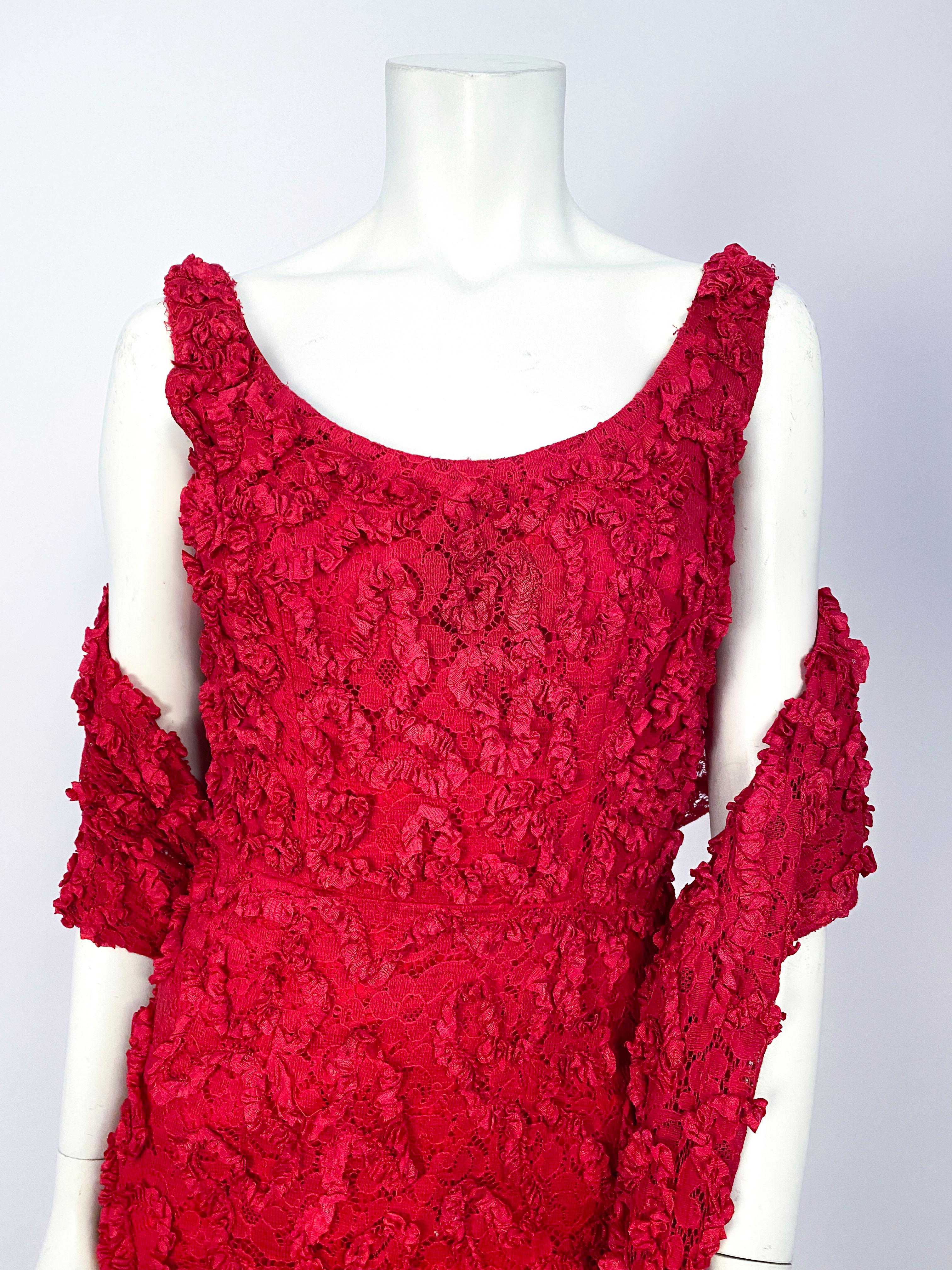 1960s red lace form-fitted cocktail dress adorned with gathered ribbon work. The matching stole is extra long and to be draped over the arms (measures 84 inches long and 14 inches wide).