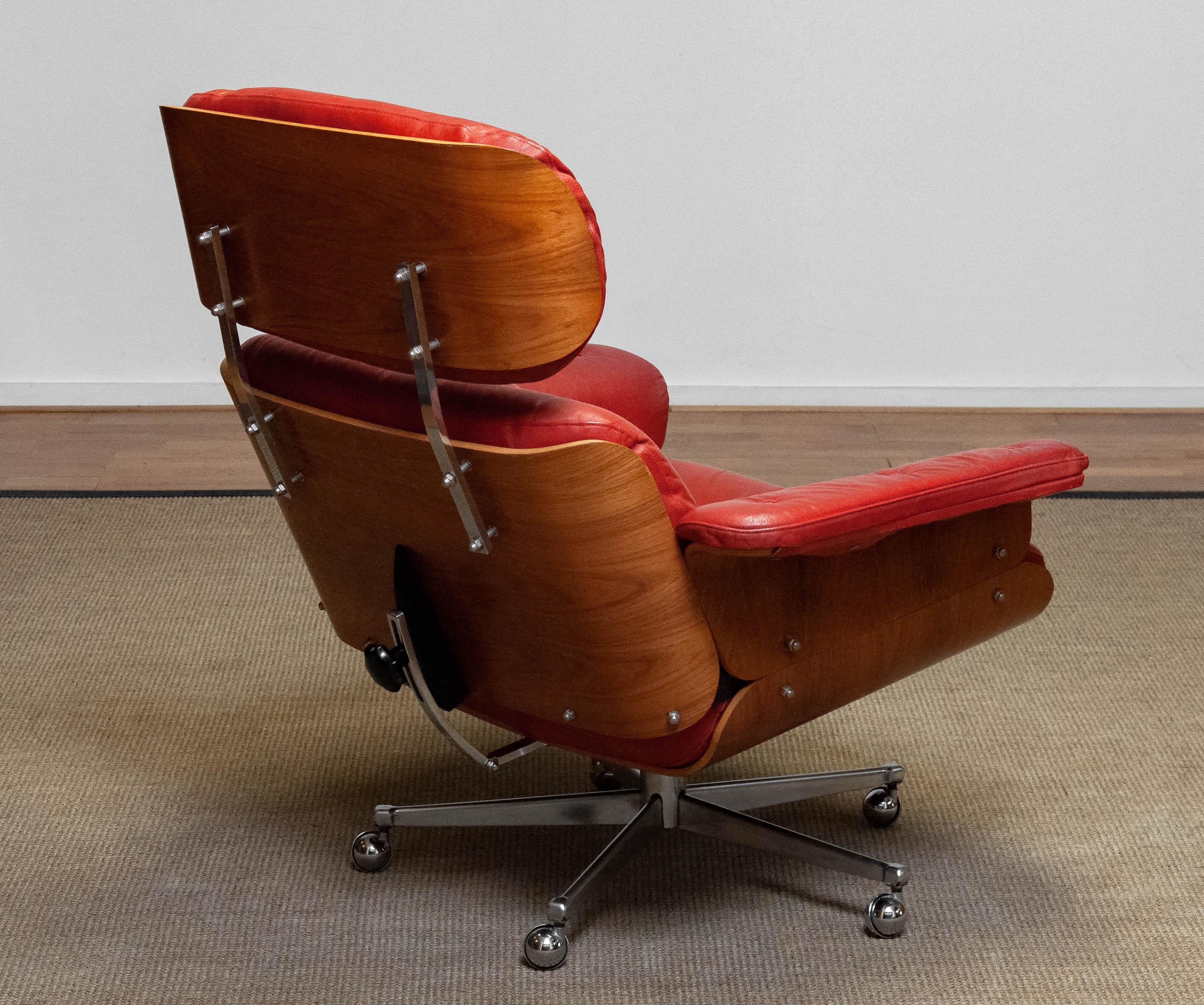 Modern 1960s Red Reclinable Swivel Chair by Martin Stoll Giroflex with Walnut Shells  For Sale