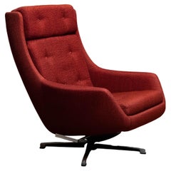 1960s Red Swivel and Rocking Lounge Chair By Alf Svensson For Dux Of Sweden.