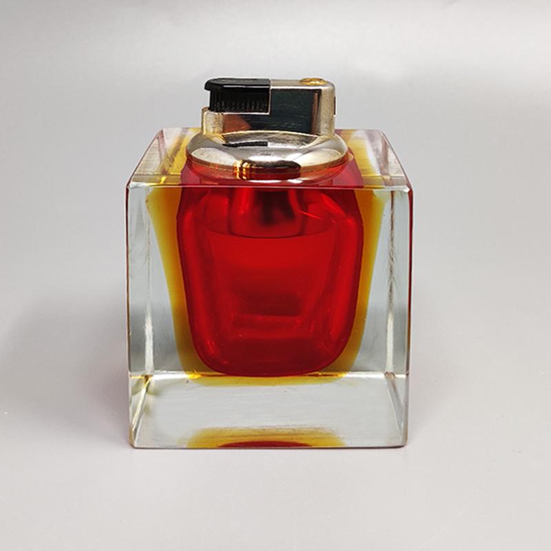 1960s Stunning red and yellow table lighter in Murano sommerso glass By Flavio Poli for Seguso. Made in italy
The item is in excellent condition and it works perfectly
Dimension:
2,75