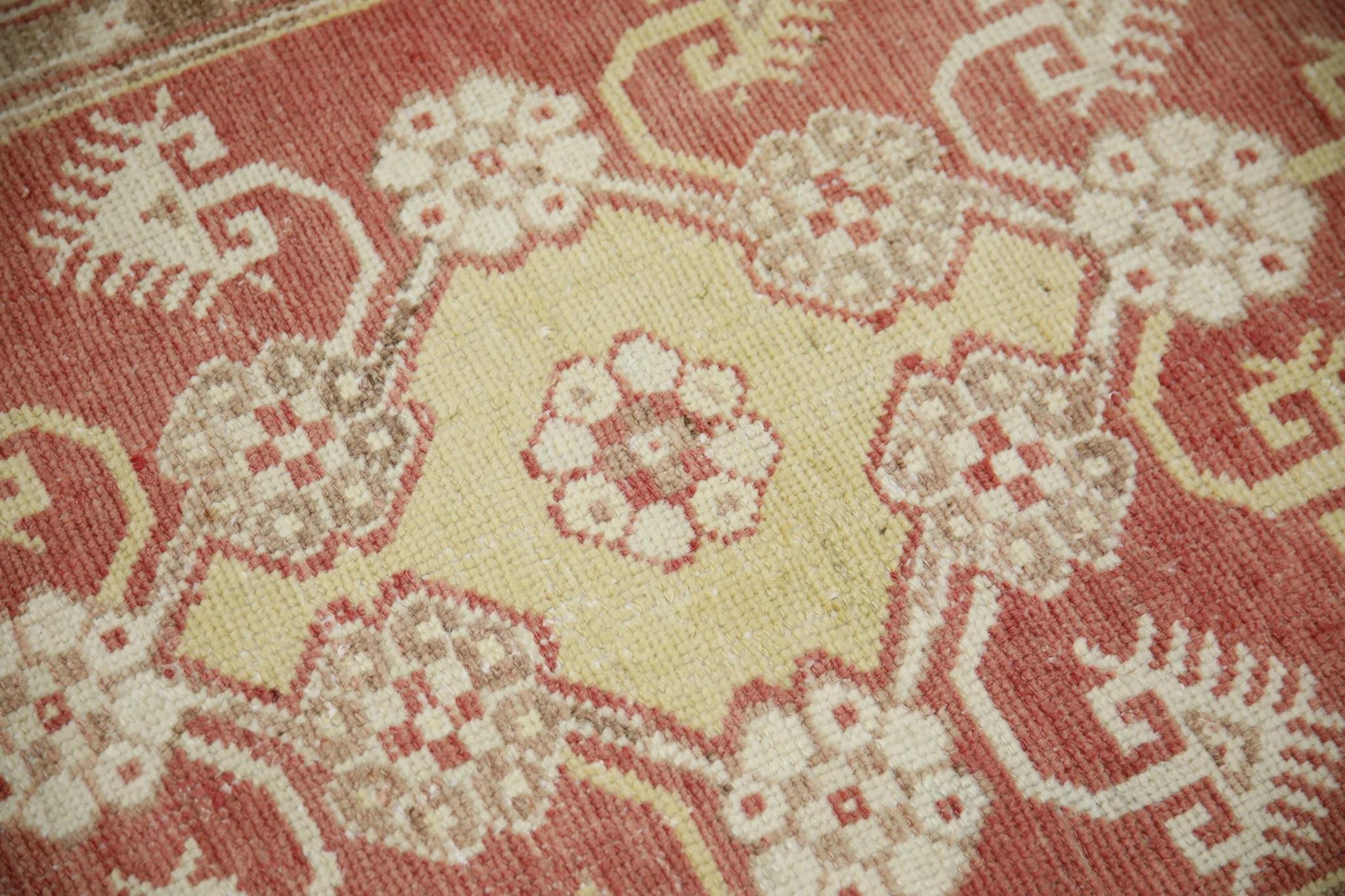 Introducing a one-of-a-kind vintage Turkish hand-knotted wool rug, carefully crafted by skilled artisans using traditional techniques passed down through generations. This exquisite rug boasts a stunning array of natural dyes, resulting in a rich