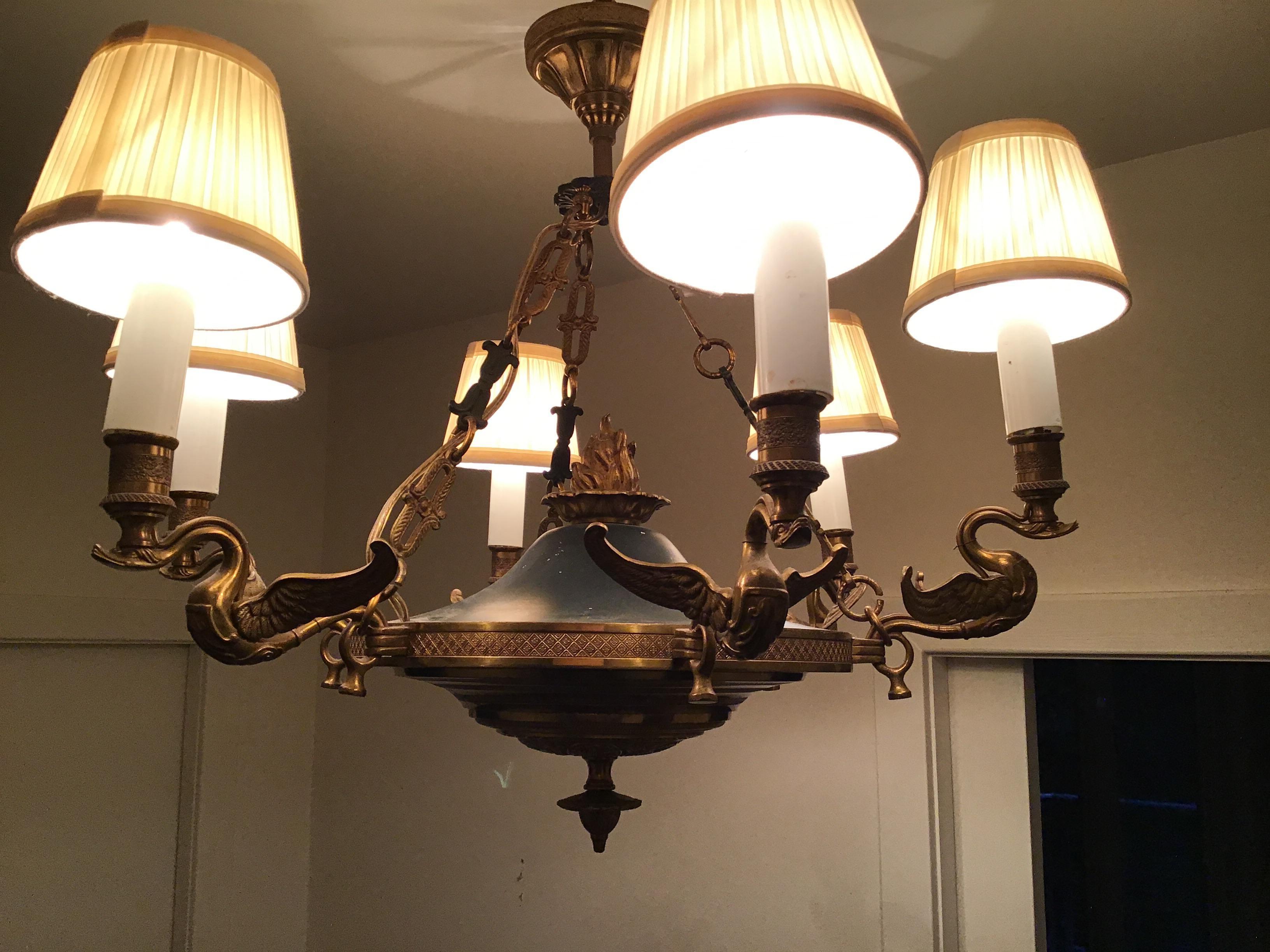 1960s regency style brass swan chandelier.