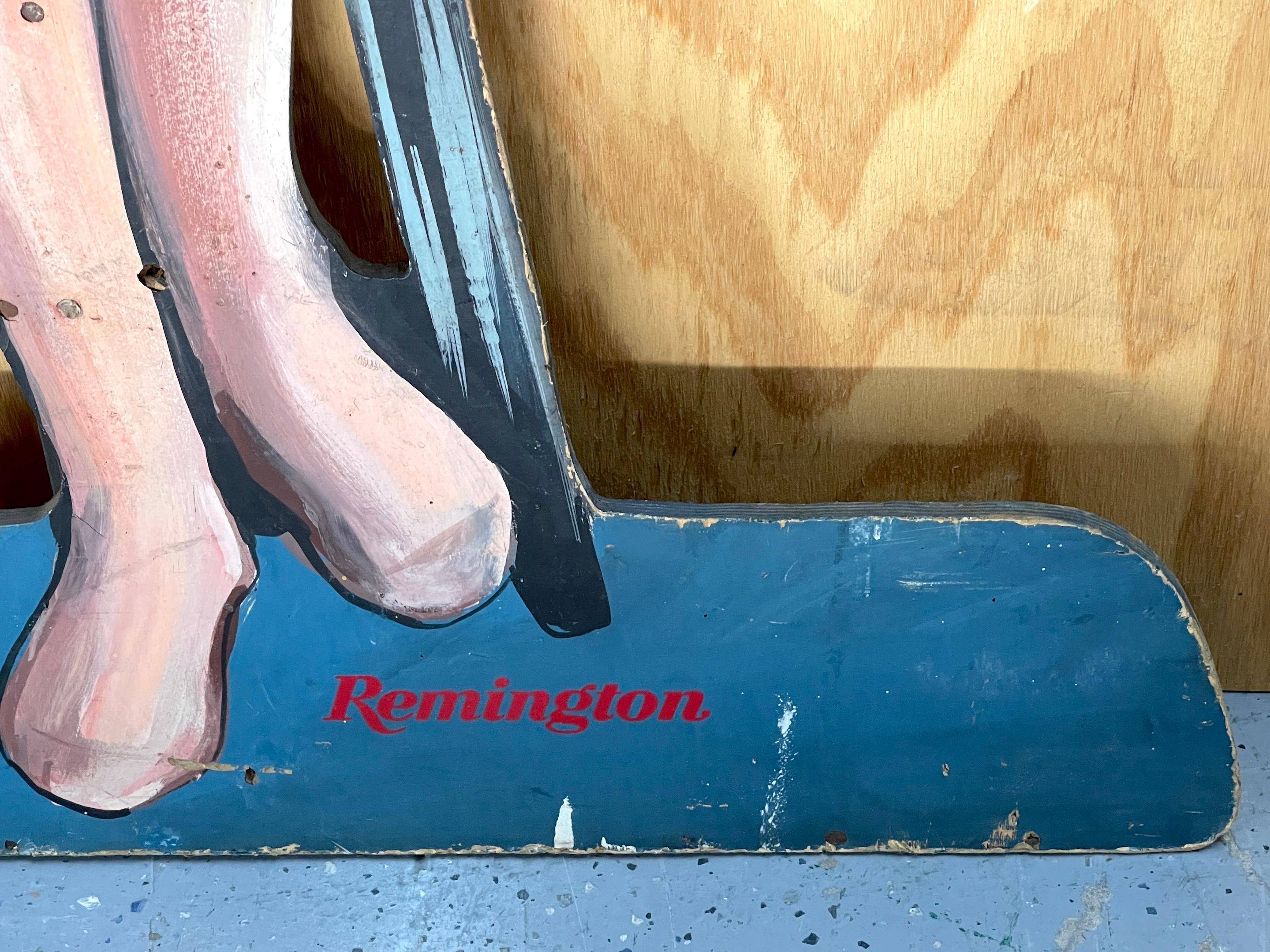20ième siècle 1960s Remington Rifle Life Size Advertising Dummy Board Seated Bond/ Mod Girl  en vente