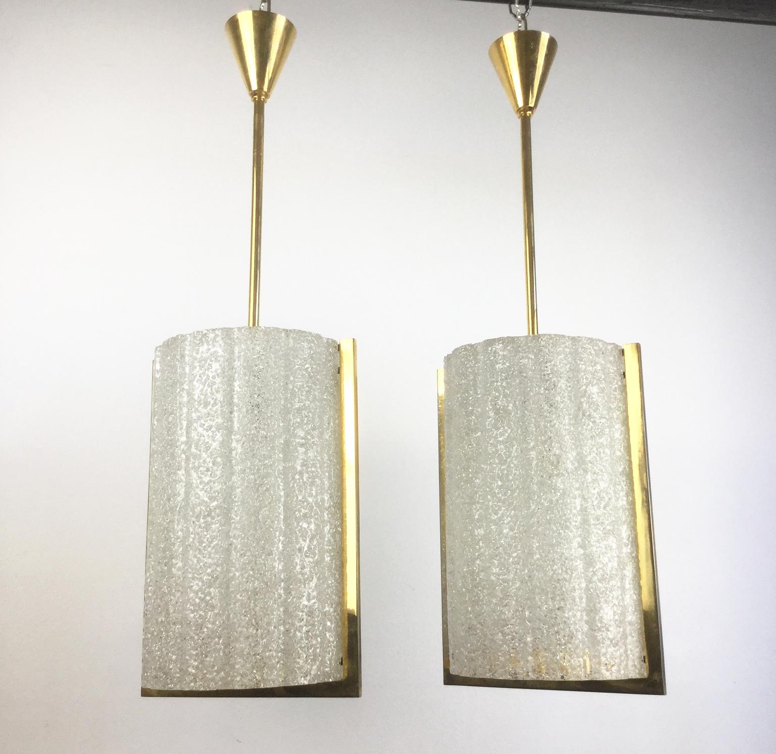 1960s, set of 4 opalescent resin and polished brass chandeliers or pendant lamps
Attributed to Maison Arlus France.
