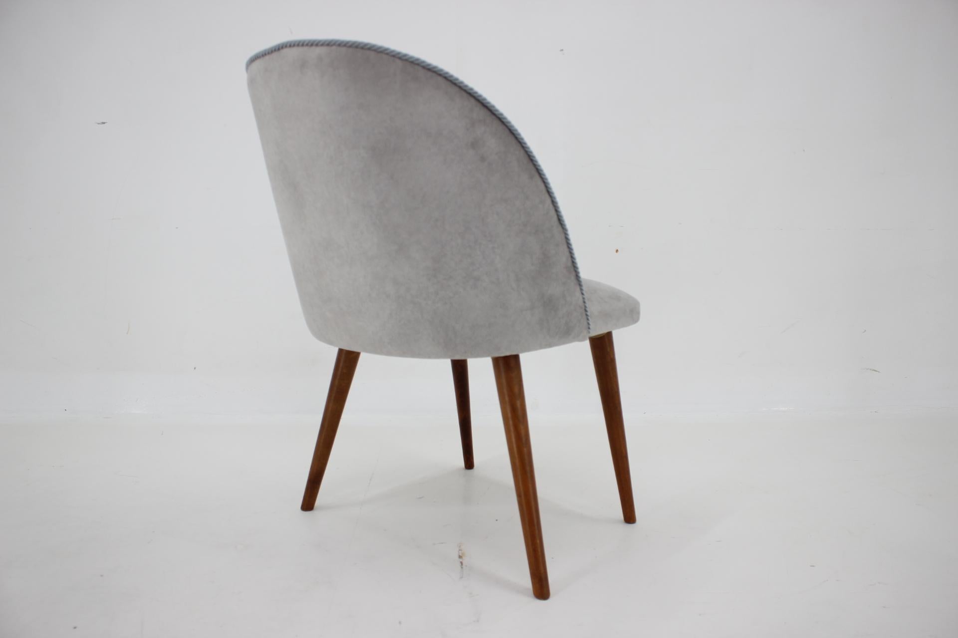 - newly upholstered 
- refurbished wooden legs 