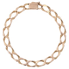 Bracelet rétro en or rose 18 carats des années 1960